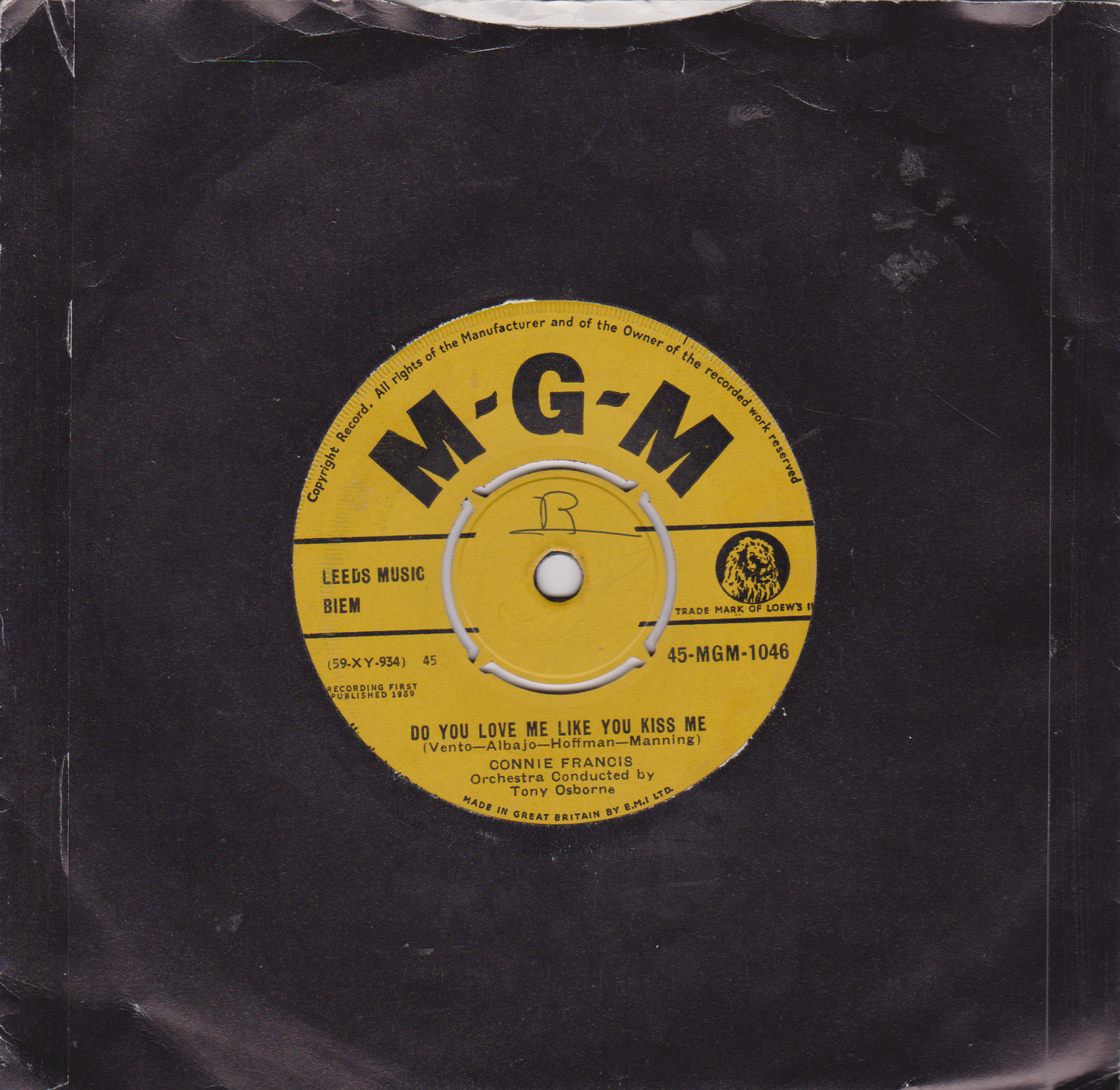 Vintage 45 RPM record label with 'M-G-M' branding on a dark background