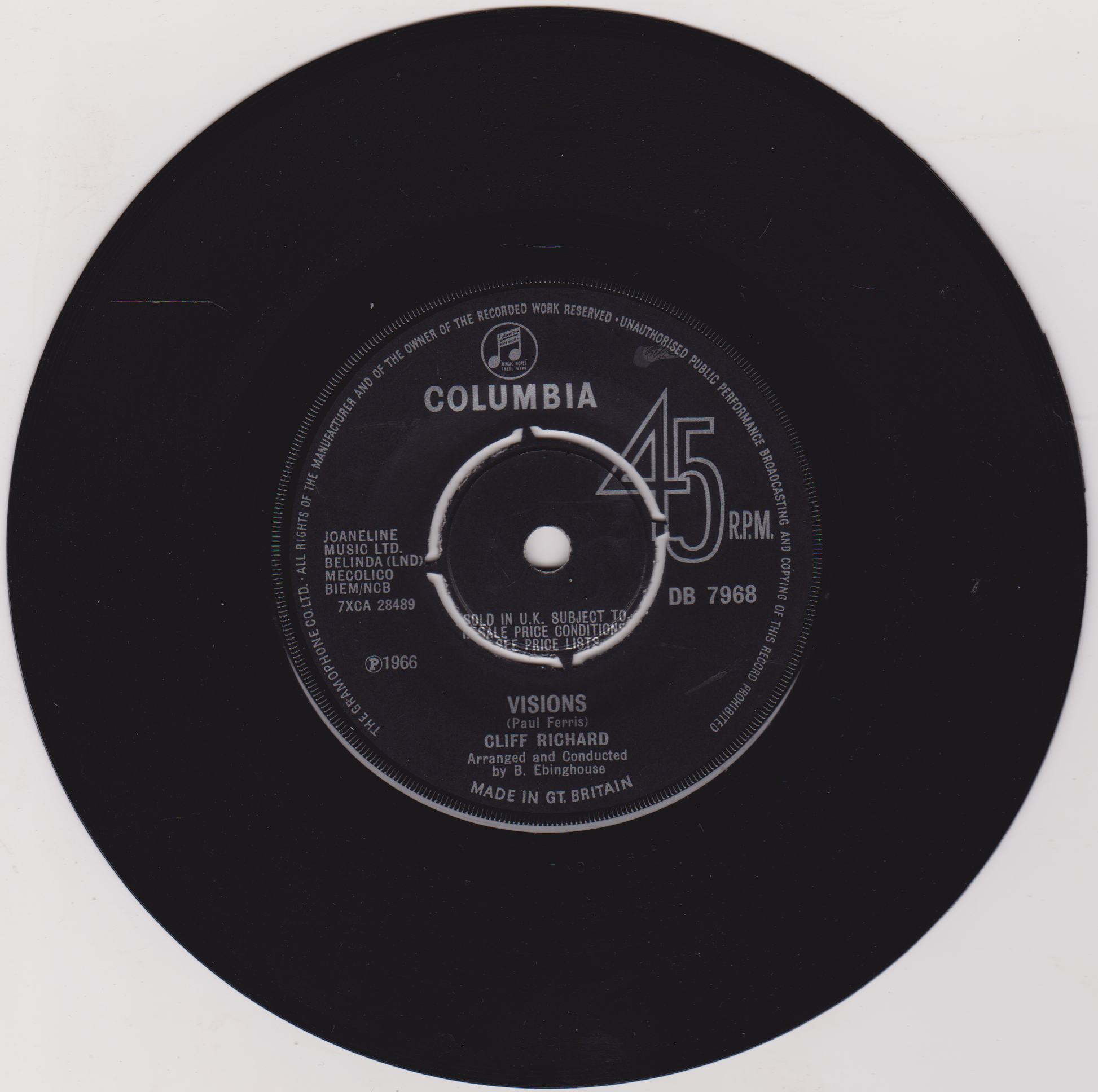 Black vinyl record with Columbia label and text on a white background