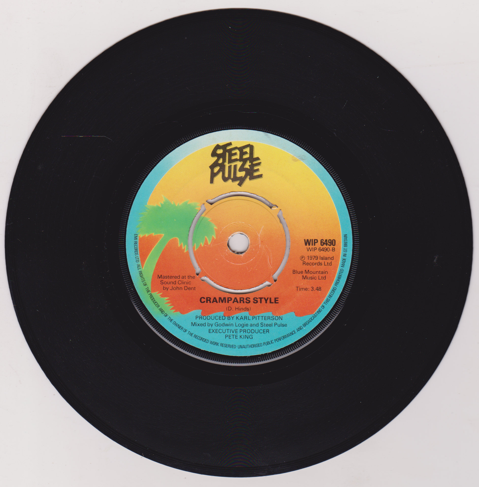 Vinyl record with a colorful label on a white background