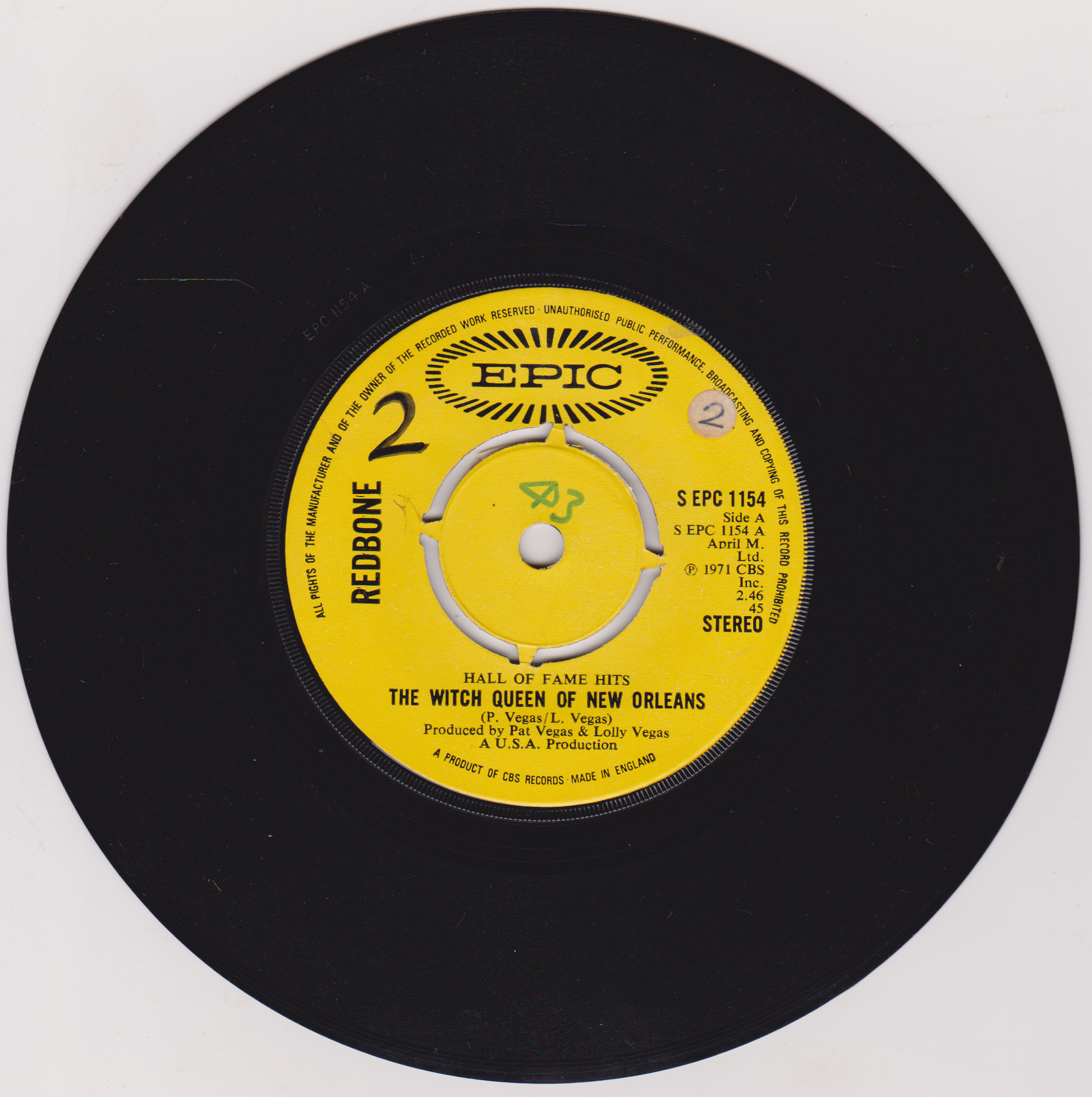 Black vinyl record with yellow label featuring 'Epic' records branding