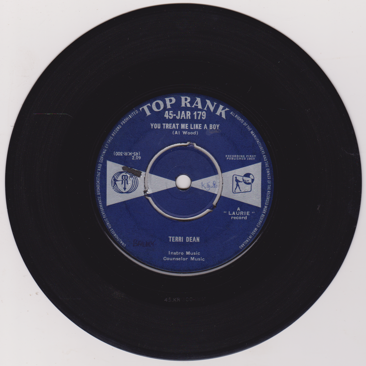 Black vinyl record with blue label featuring 'Top Rank' on a white background