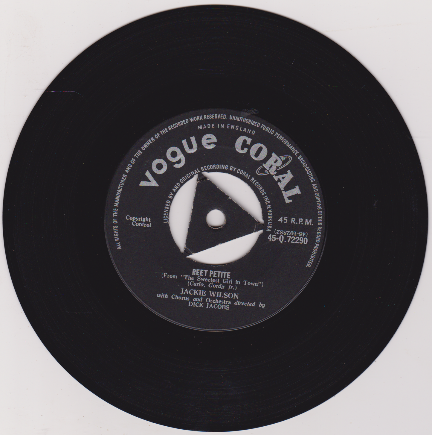 Black vinyl record with 'Vogue Coral' label on a white background