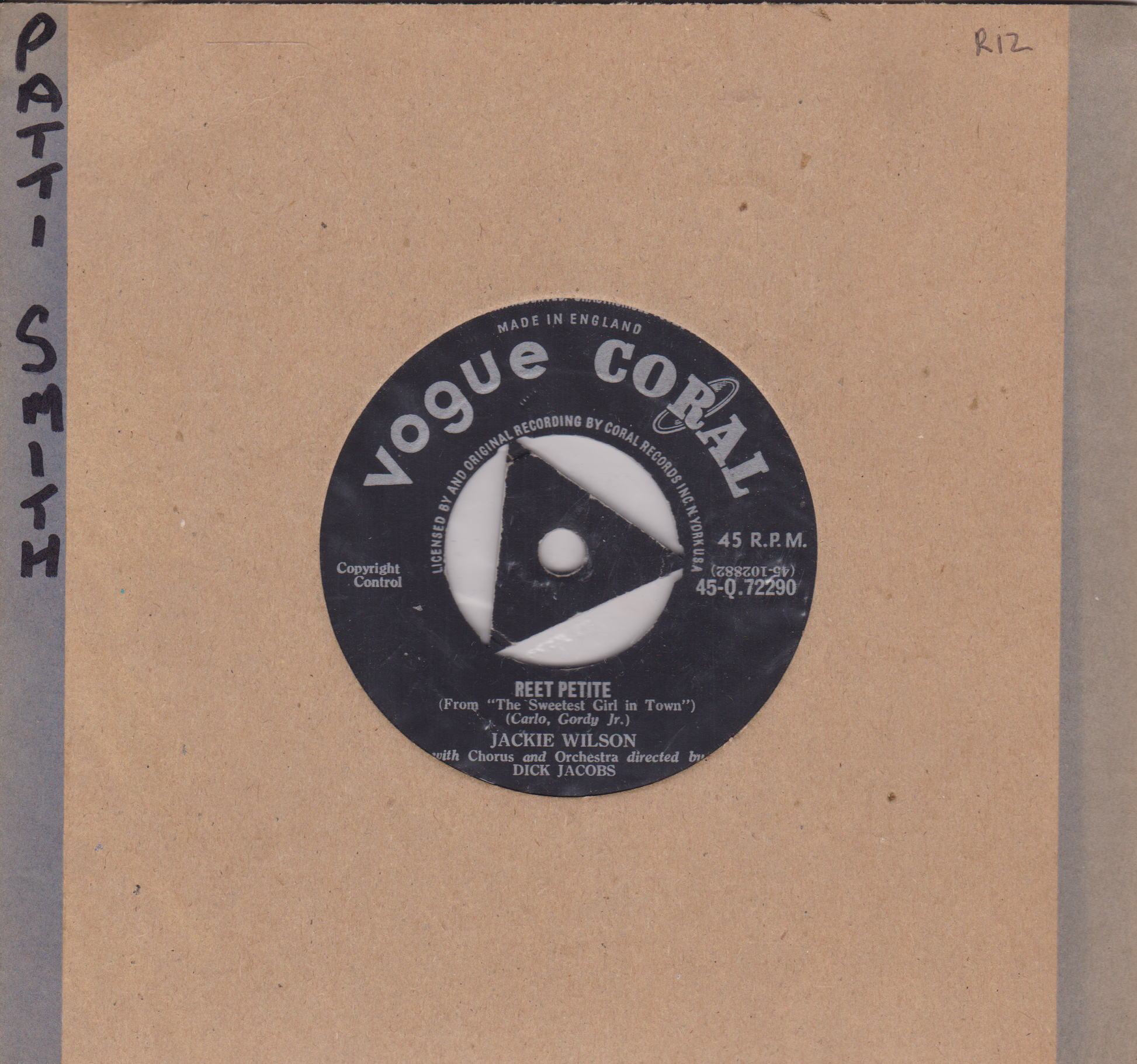 Vogue Coral record label on a brown card background with text