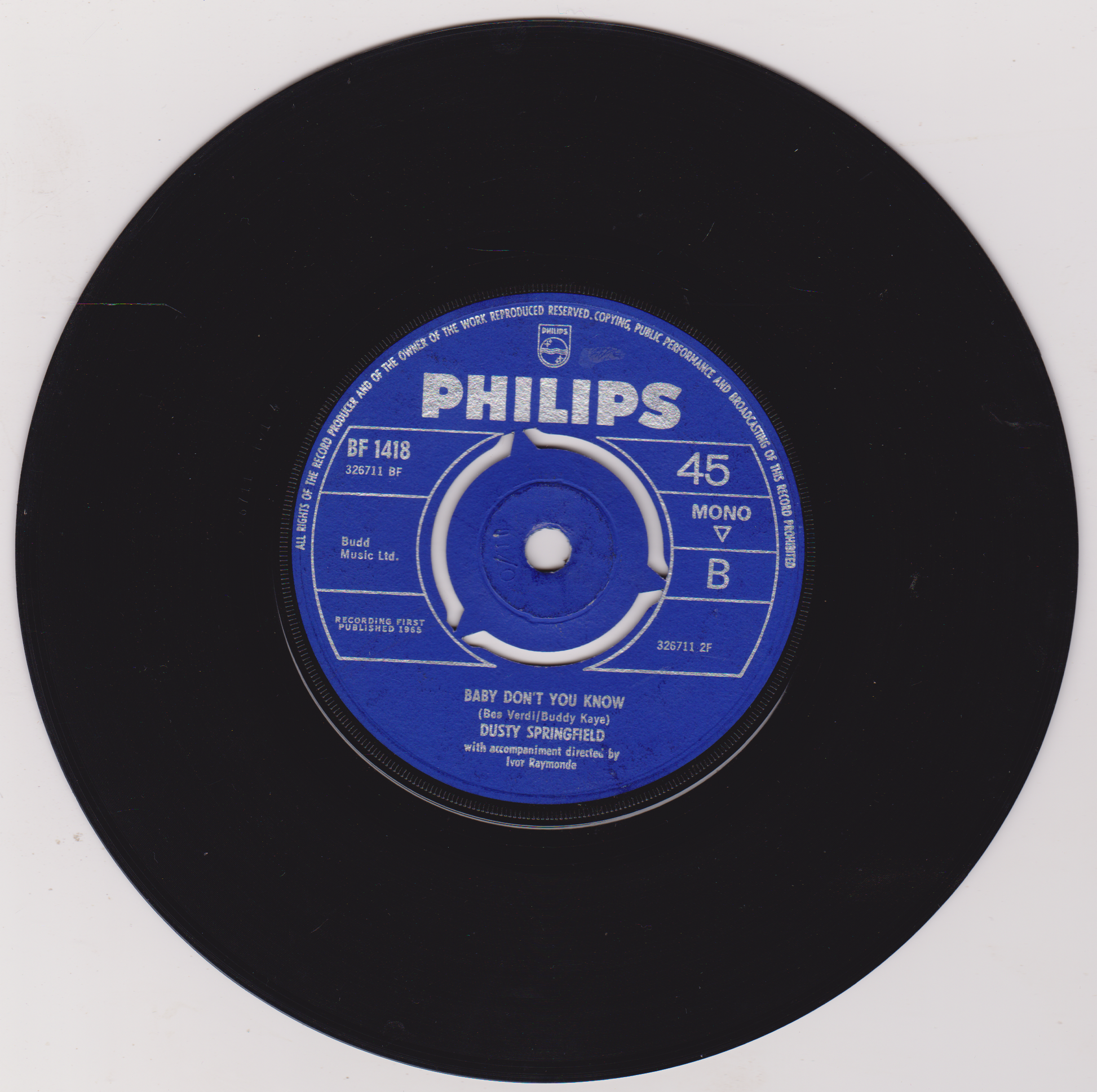 Black vinyl record with a blue Philips label on a white background