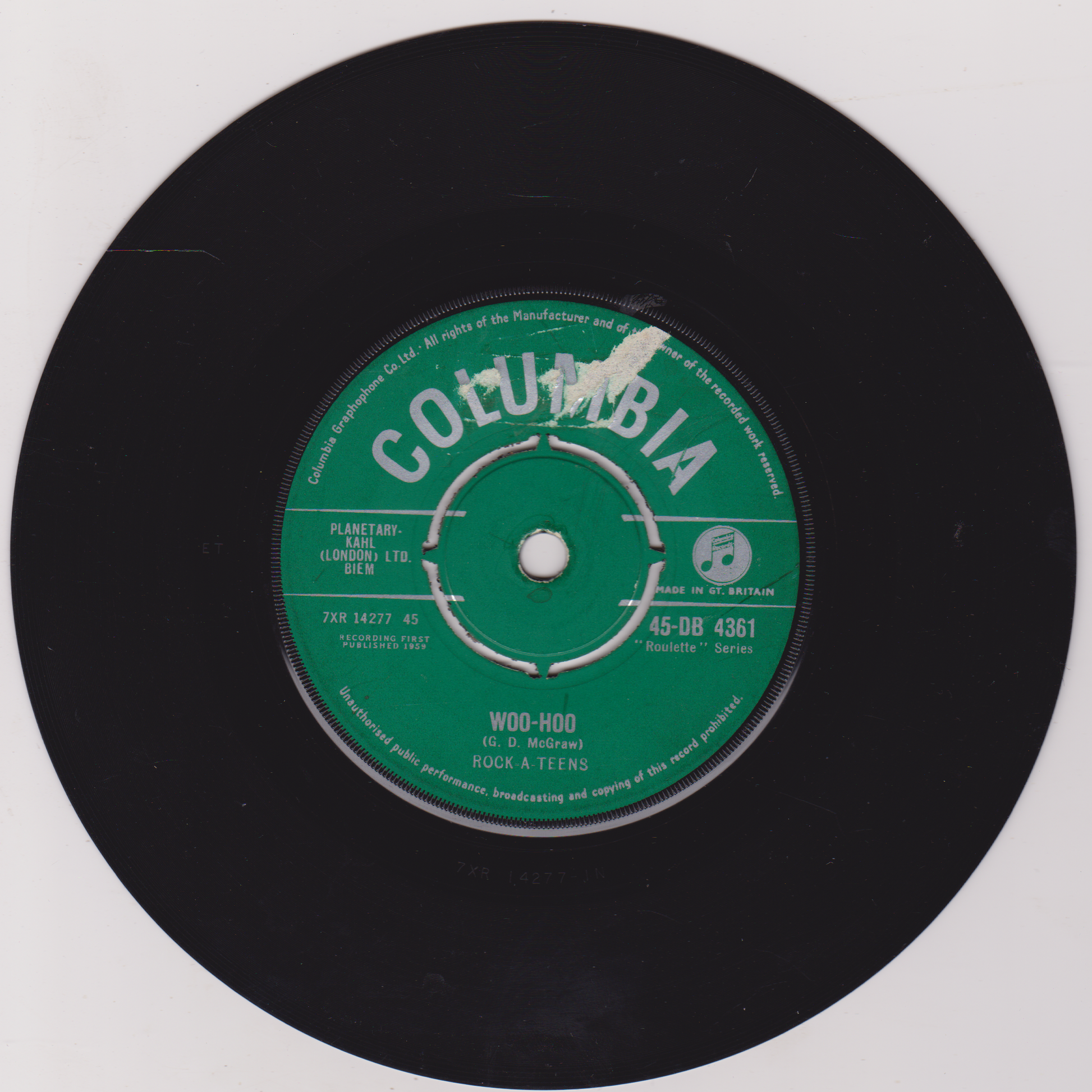 Columbia record label on a black vinyl record with a white center.