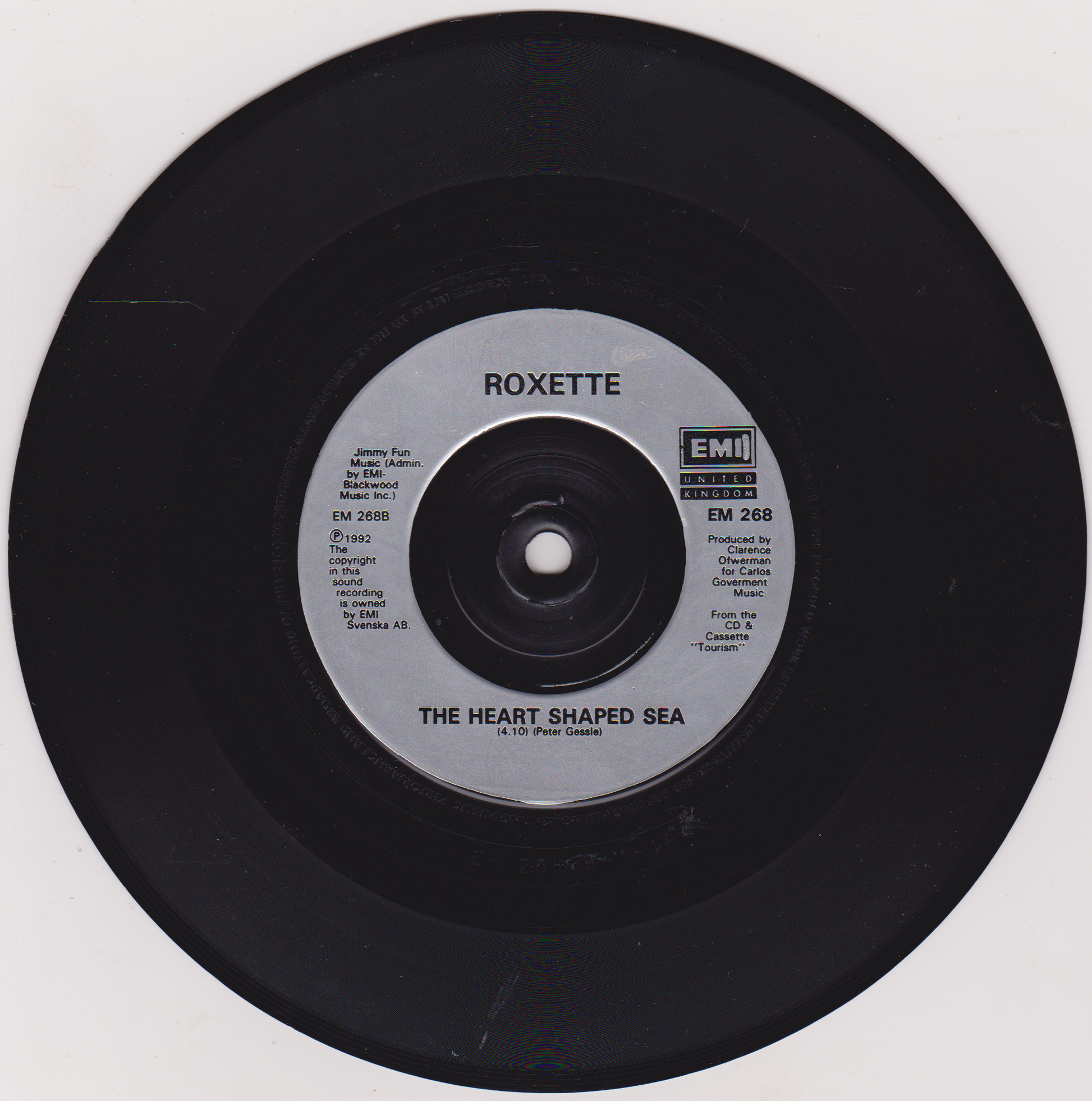 Black vinyl record with a silver label featuring the band Roxette and the song 'The Heart Shaped Sea'.