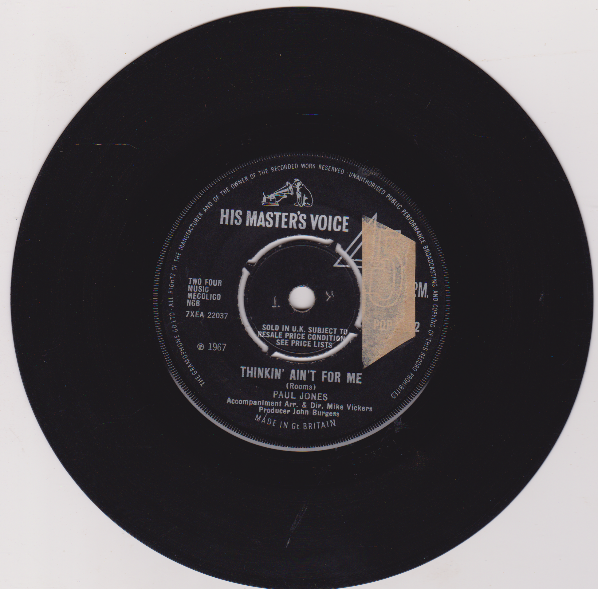 Record label with 'His Master's Voice' logo on a black vinyl record