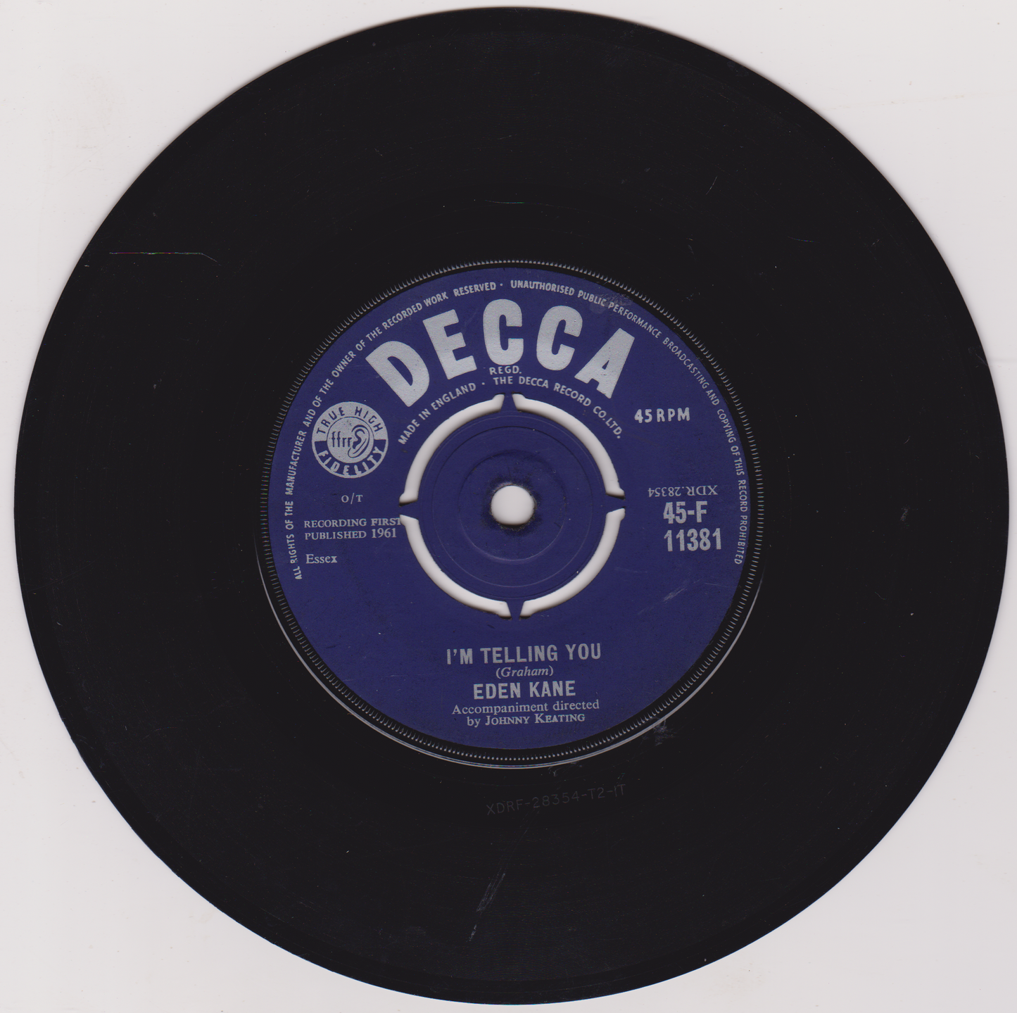Black vinyl record with a blue Decca label on a white background