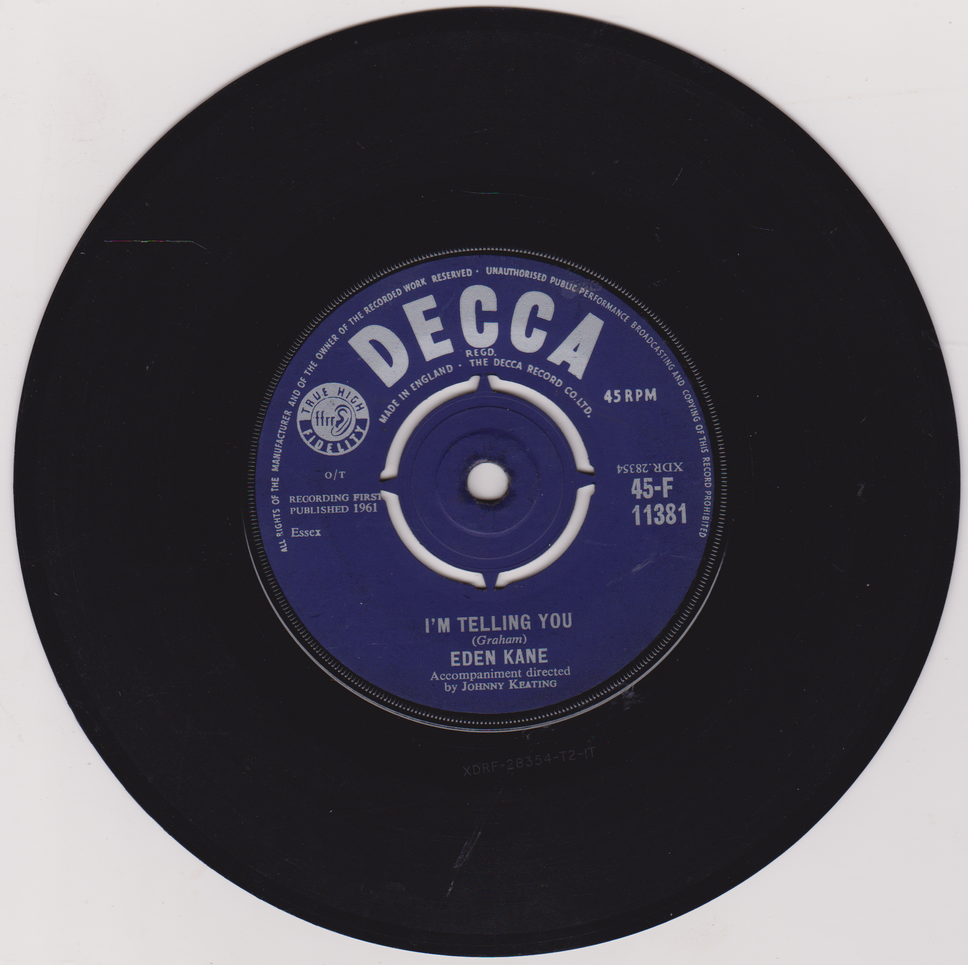 Black vinyl record with a blue Decca label on a white background