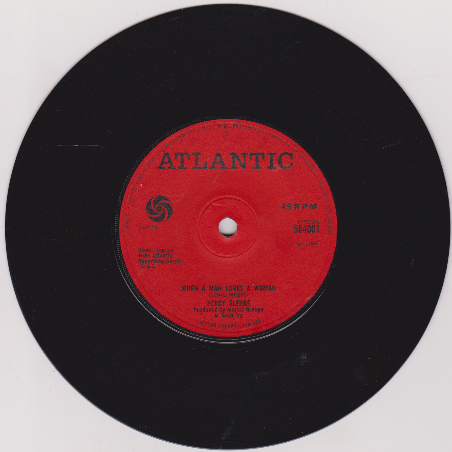 Vinyl record with red label featuring Atlantic Records logo