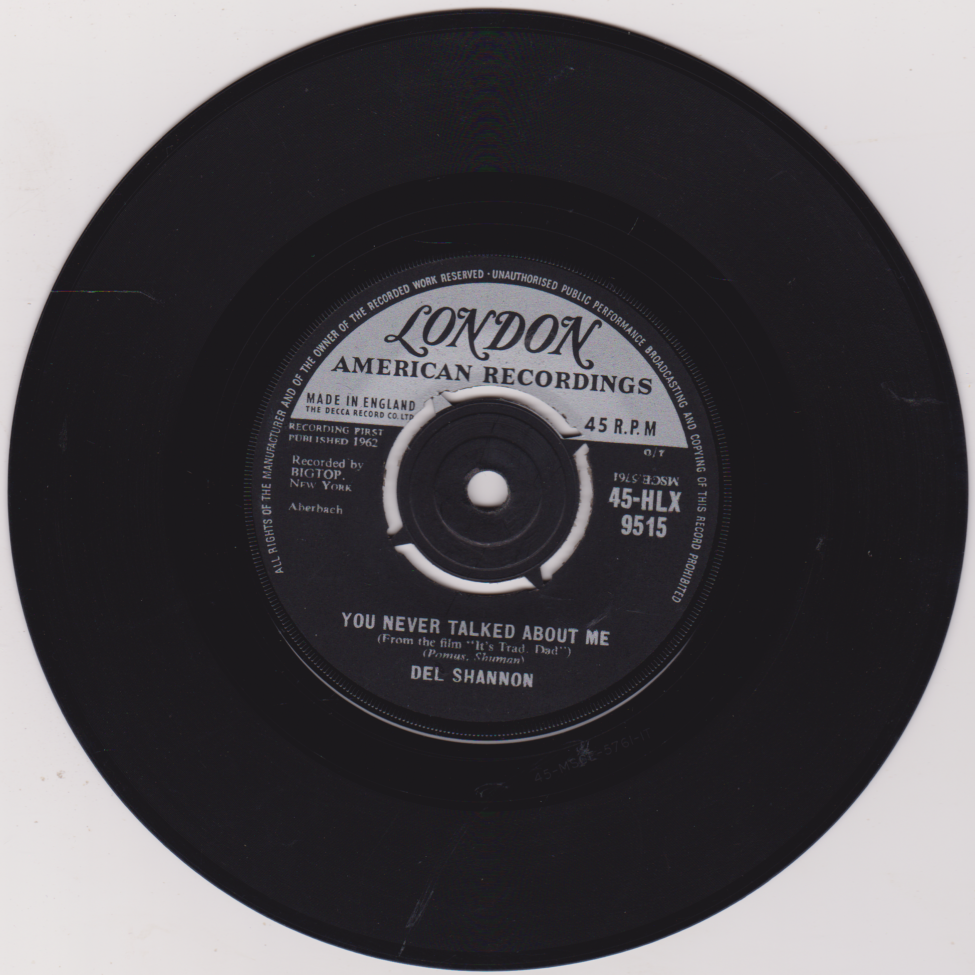 Black vinyl record with 'London American Recordings' label on a white background