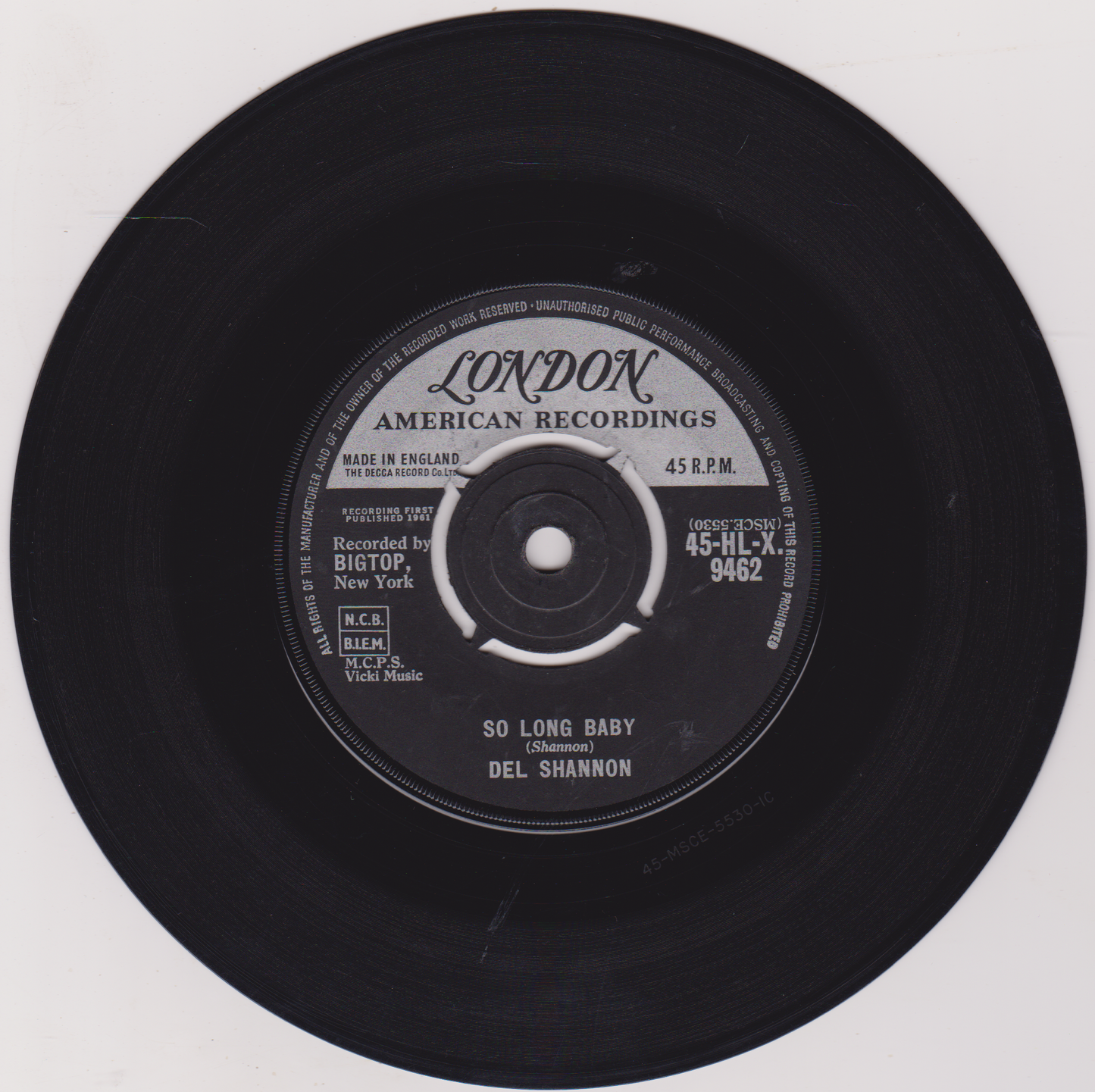 Black vinyl record with 'London American Recordings' label on a white background