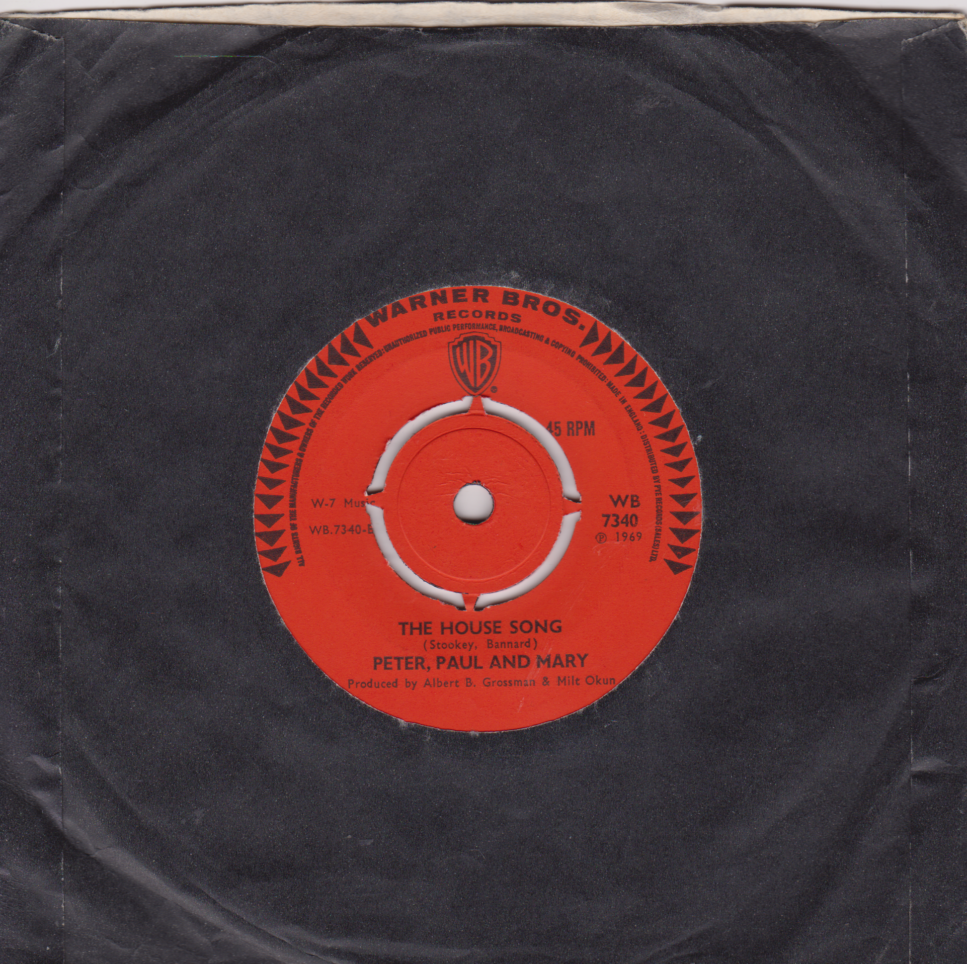 Record label for 'The House Song' by Peter, Paul and Mary on a Warner Bros. Records sleeve.