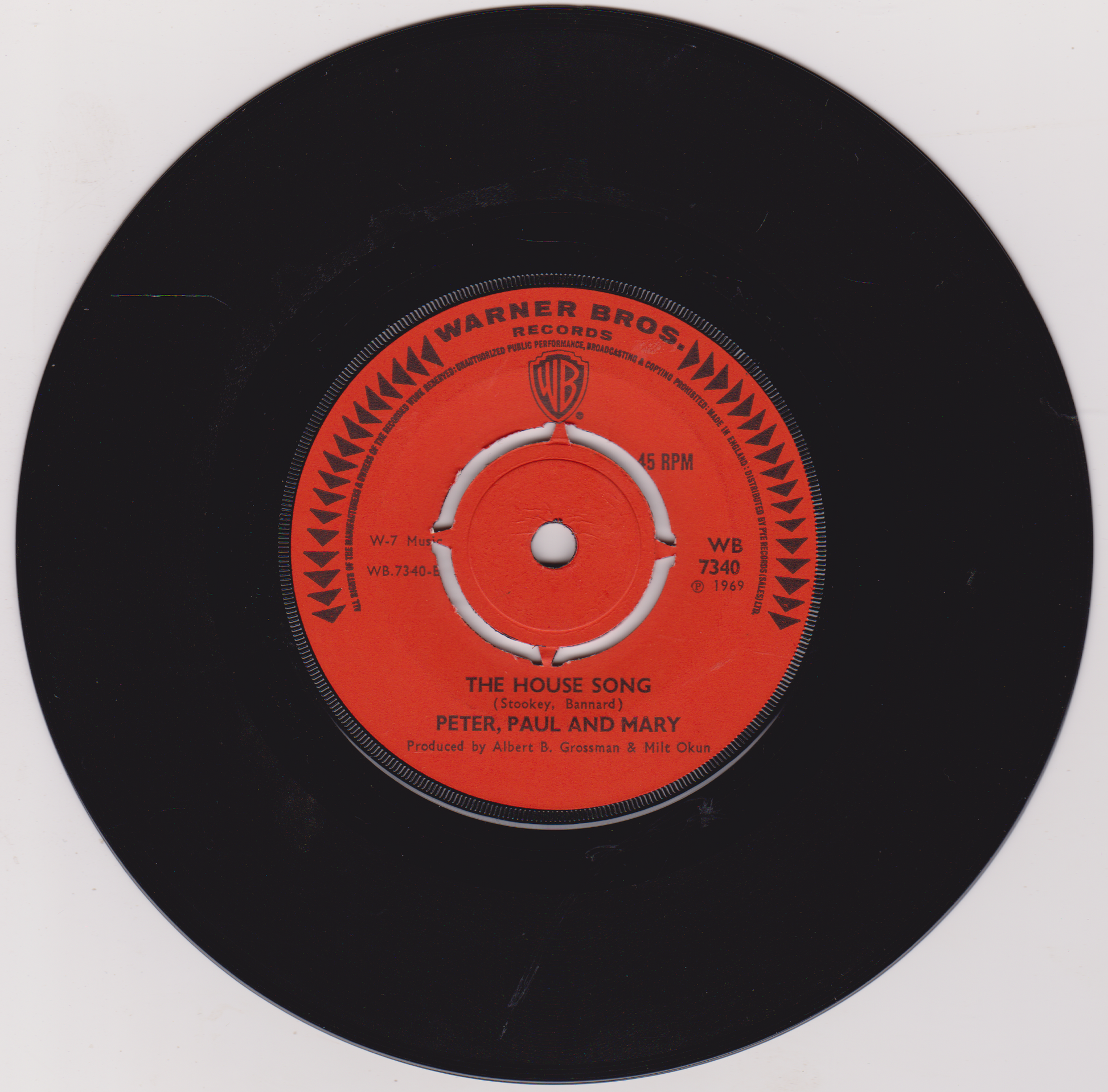 Record label for 'The House Song' by Peter, Paul and Mary on a Warner Bros. Records sleeve.
