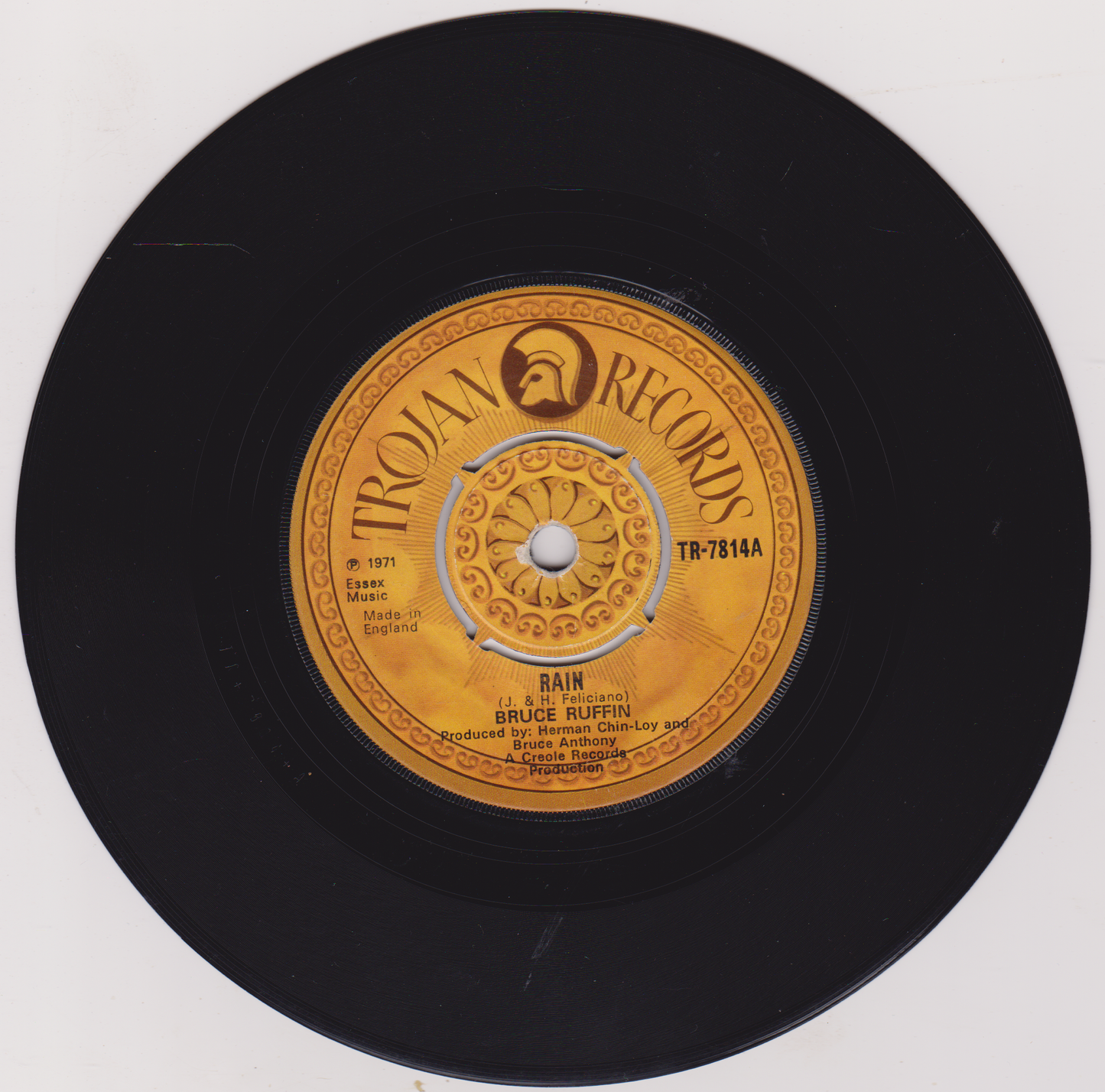 Vinyl record with Trojan Records label on a white background
