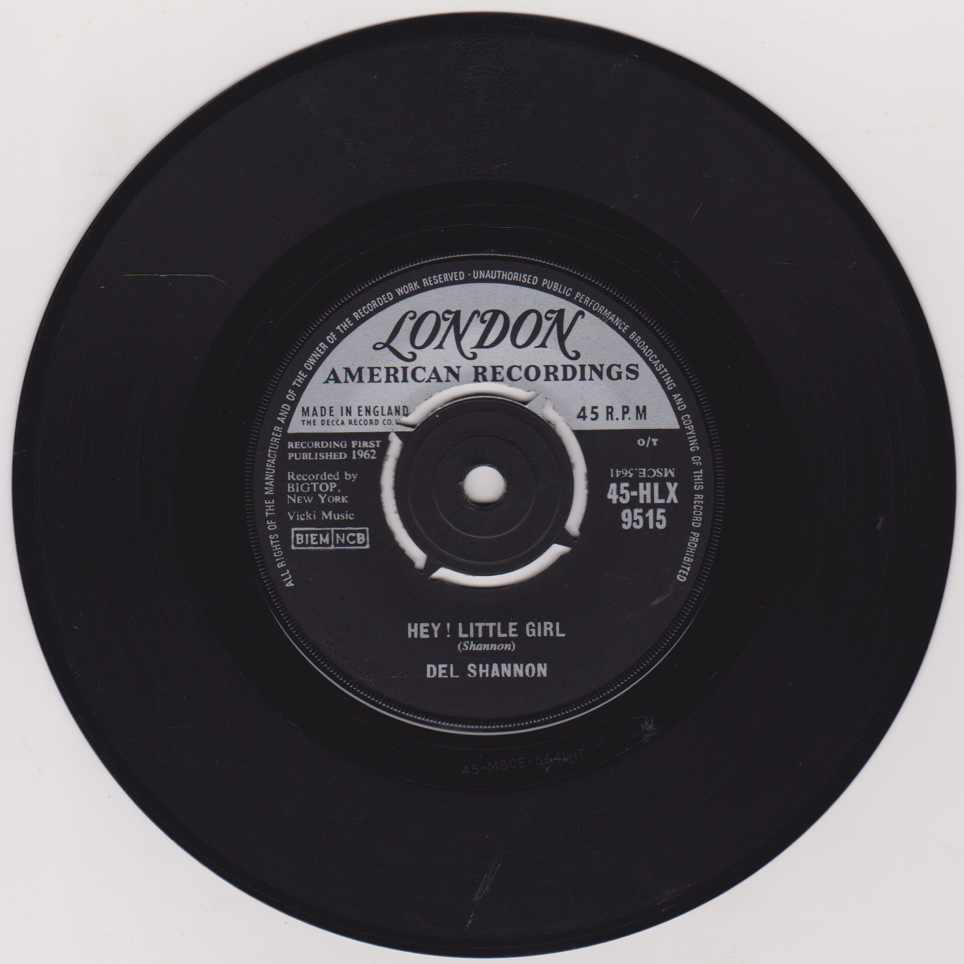 Black vinyl record with 'London American Recordings' label on a white background