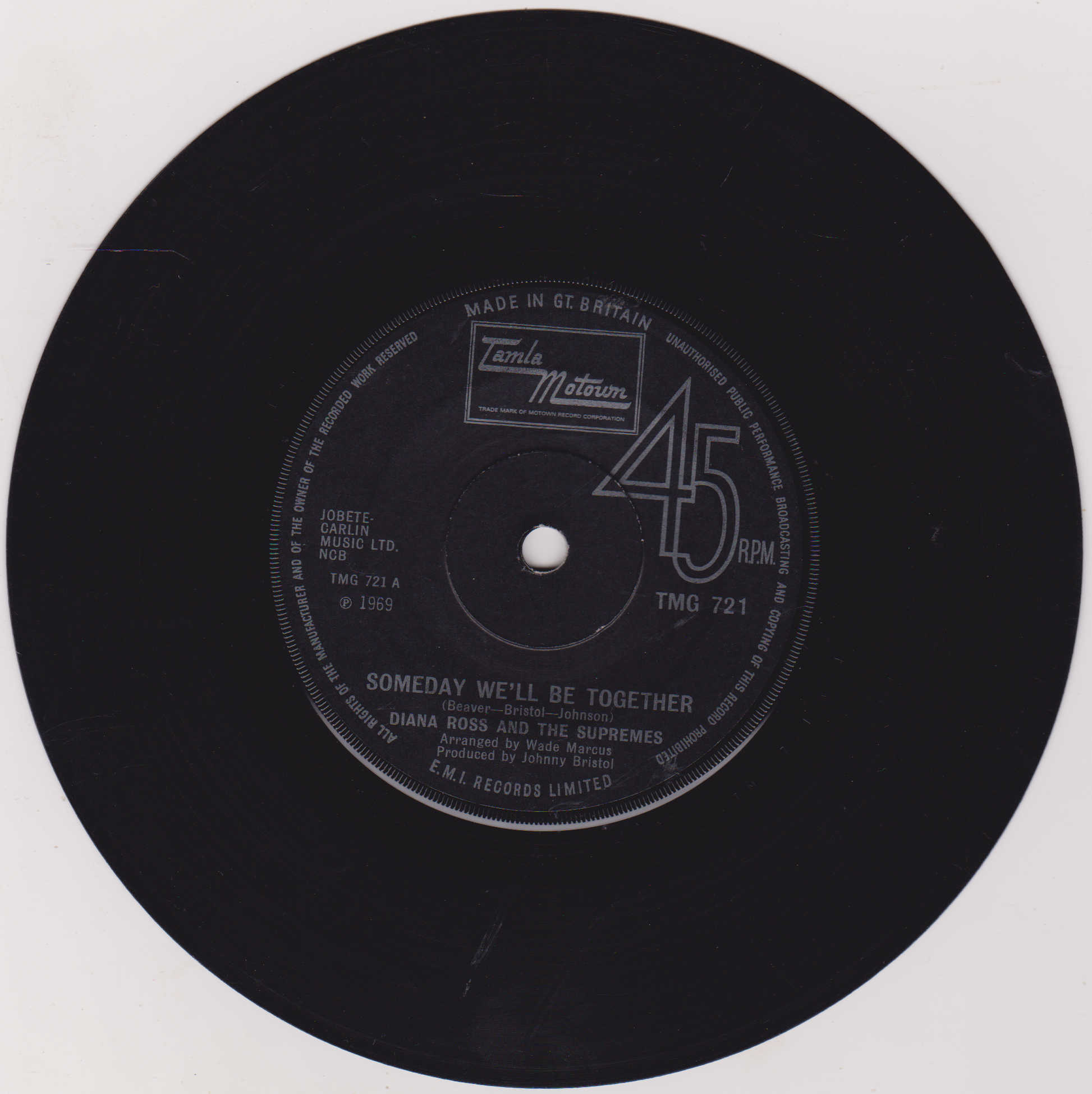 Black vinyl record label with text and branding on a white background