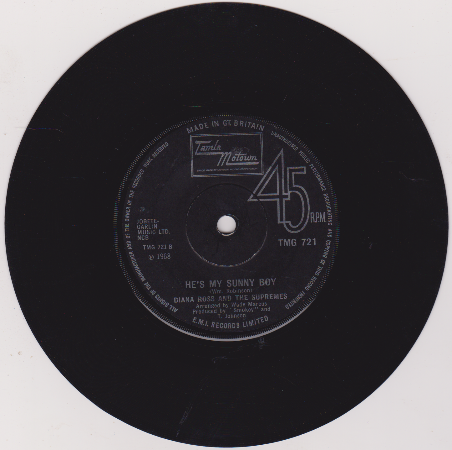 Black vinyl record with label on a white background