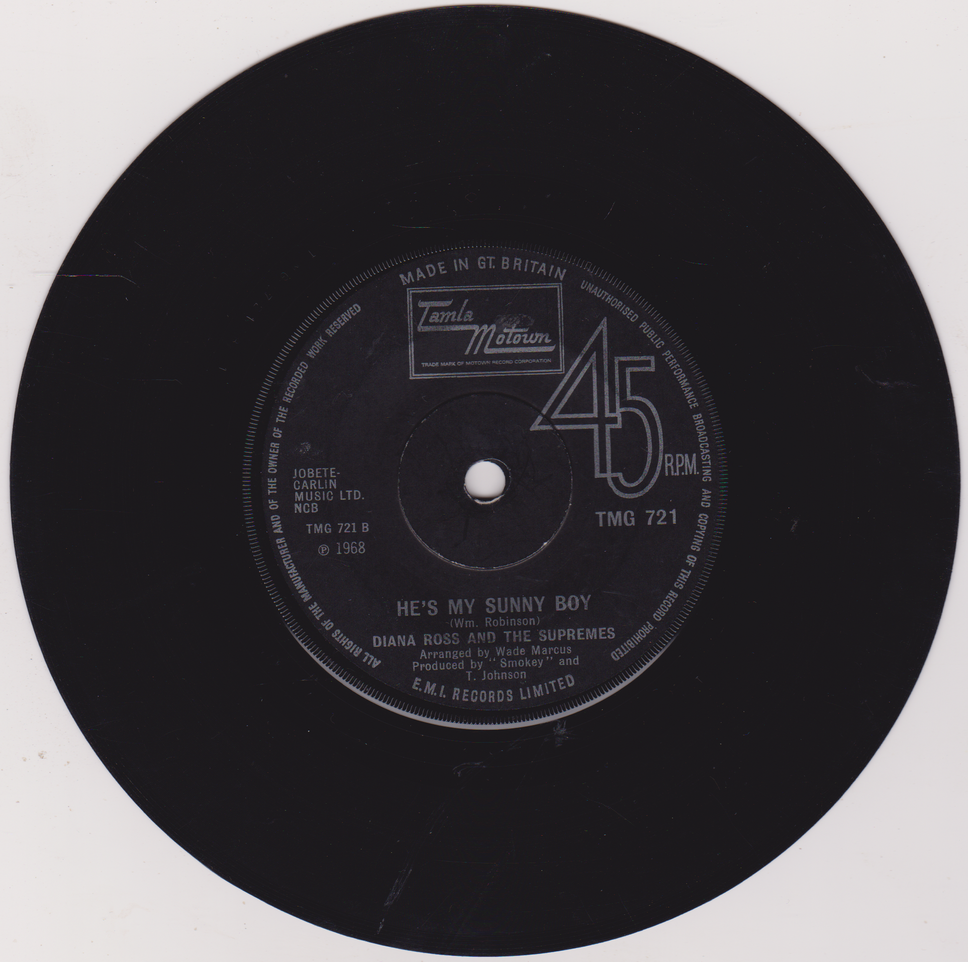 Black vinyl record with label on a white background