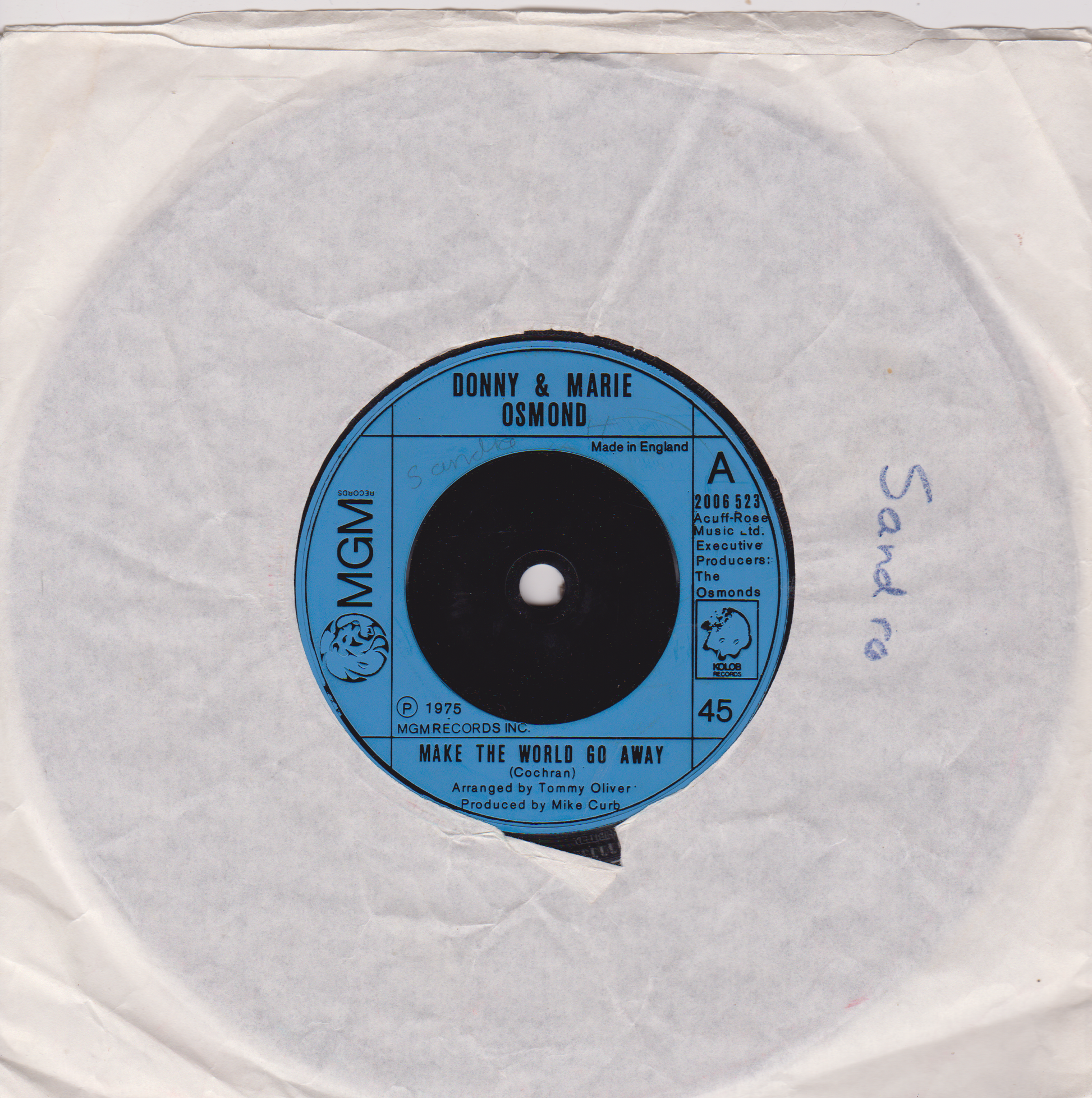 Record label of a vinyl record with 'Donny & Marie Osmond' on a white background