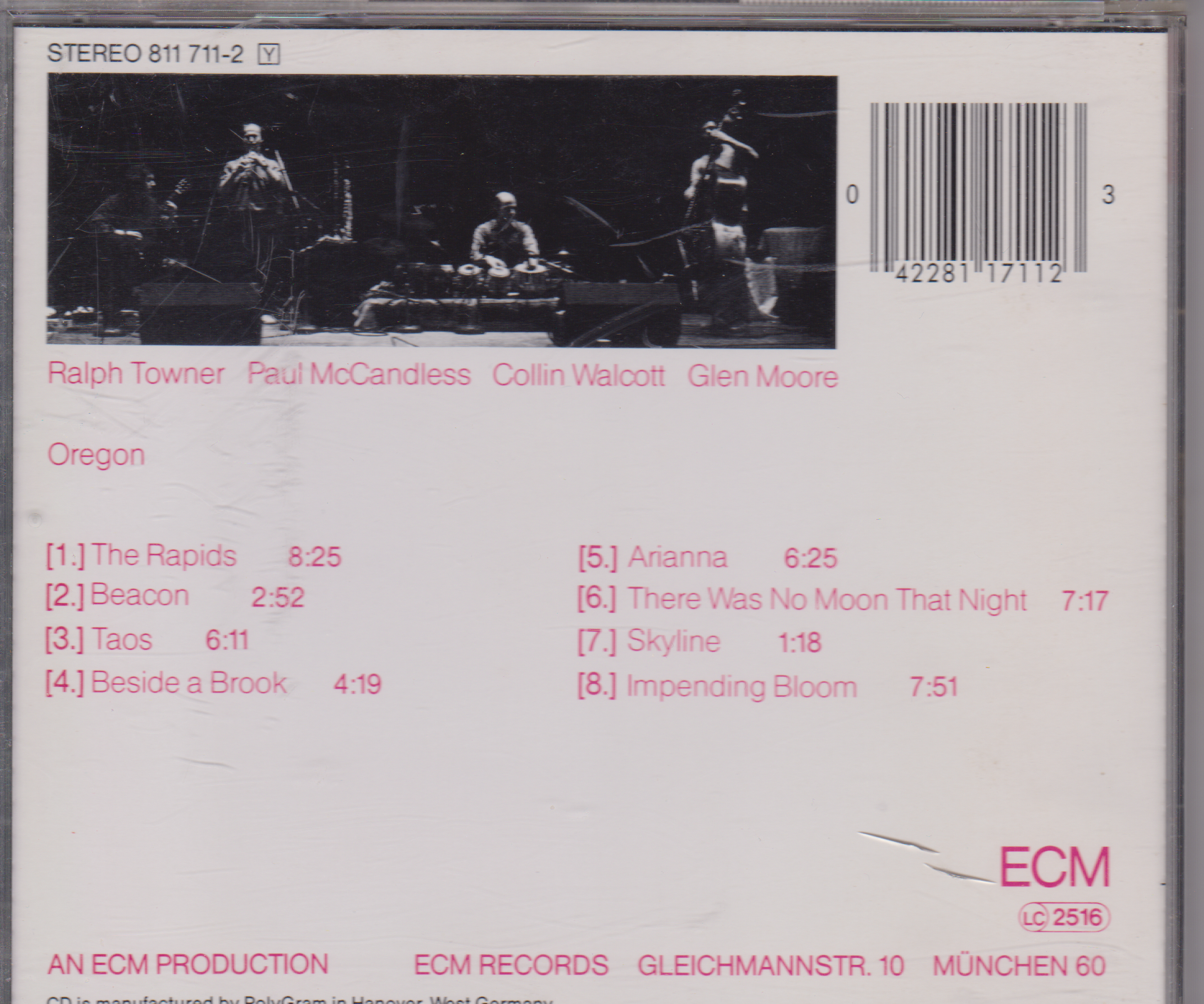 Back cover of a music CD featuring a band on stage with track listings and ECM Records branding.