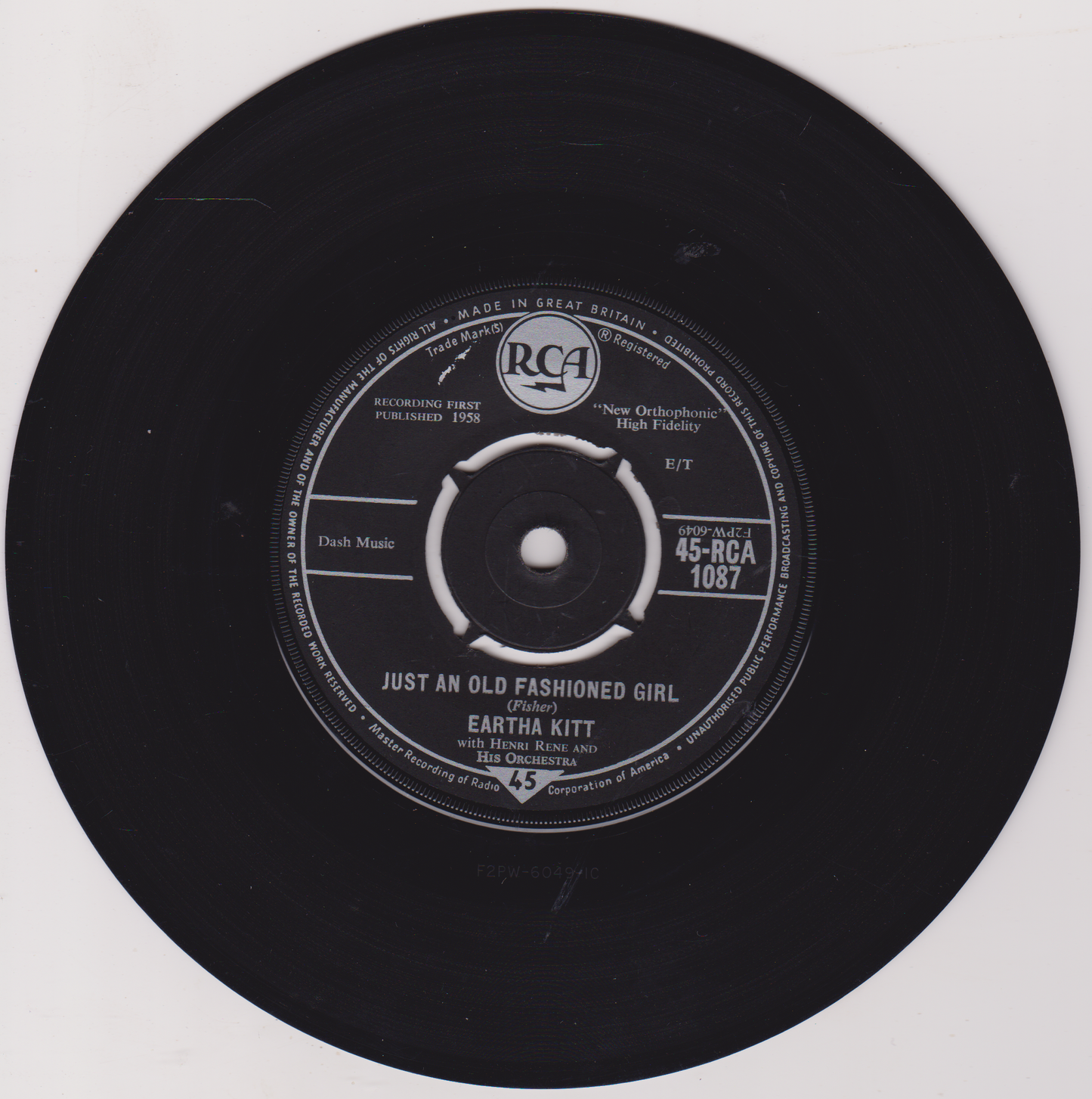 Black vinyl record with RCA label and text on a white background