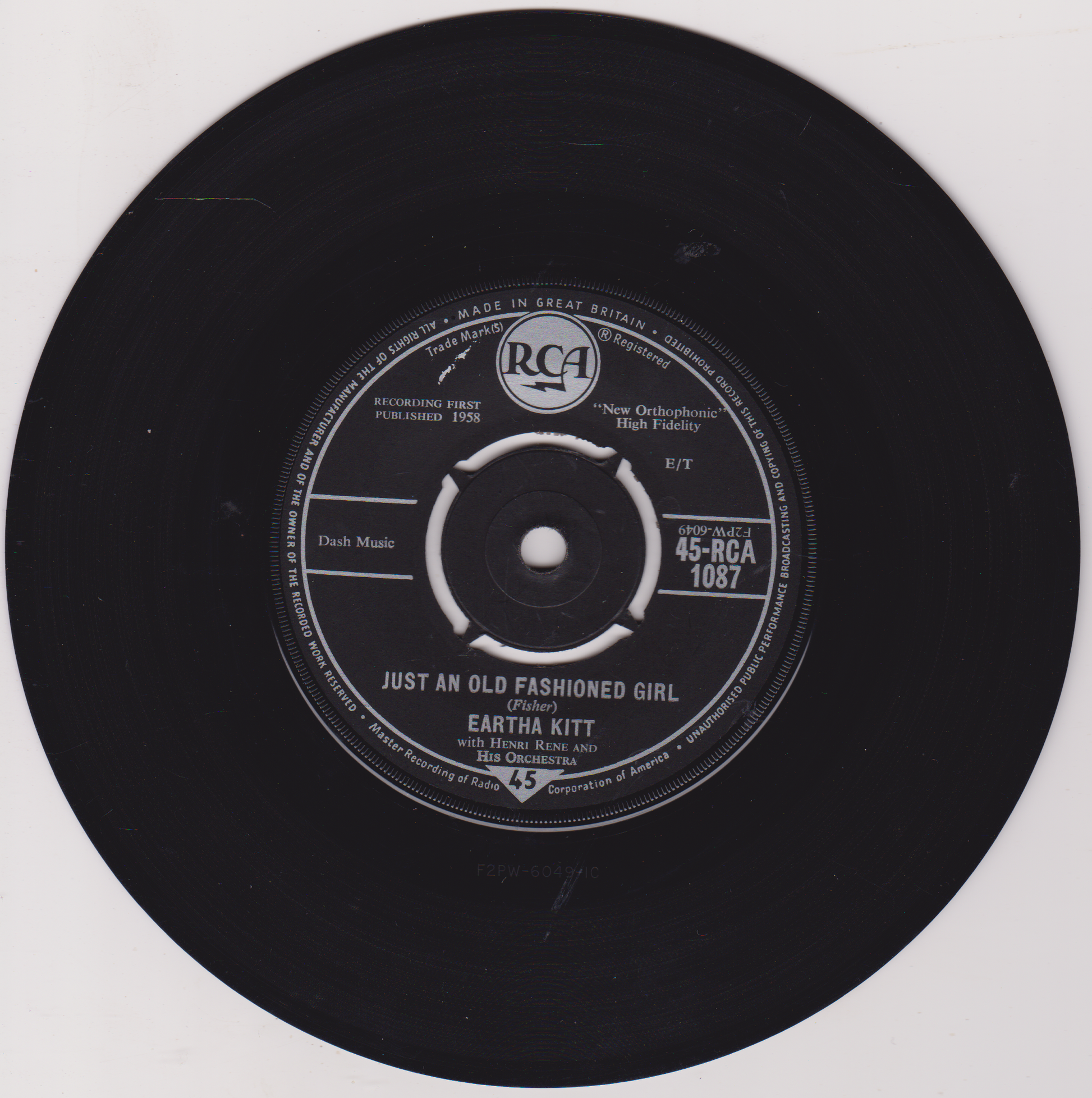 Black vinyl record with RCA label and text on a white background
