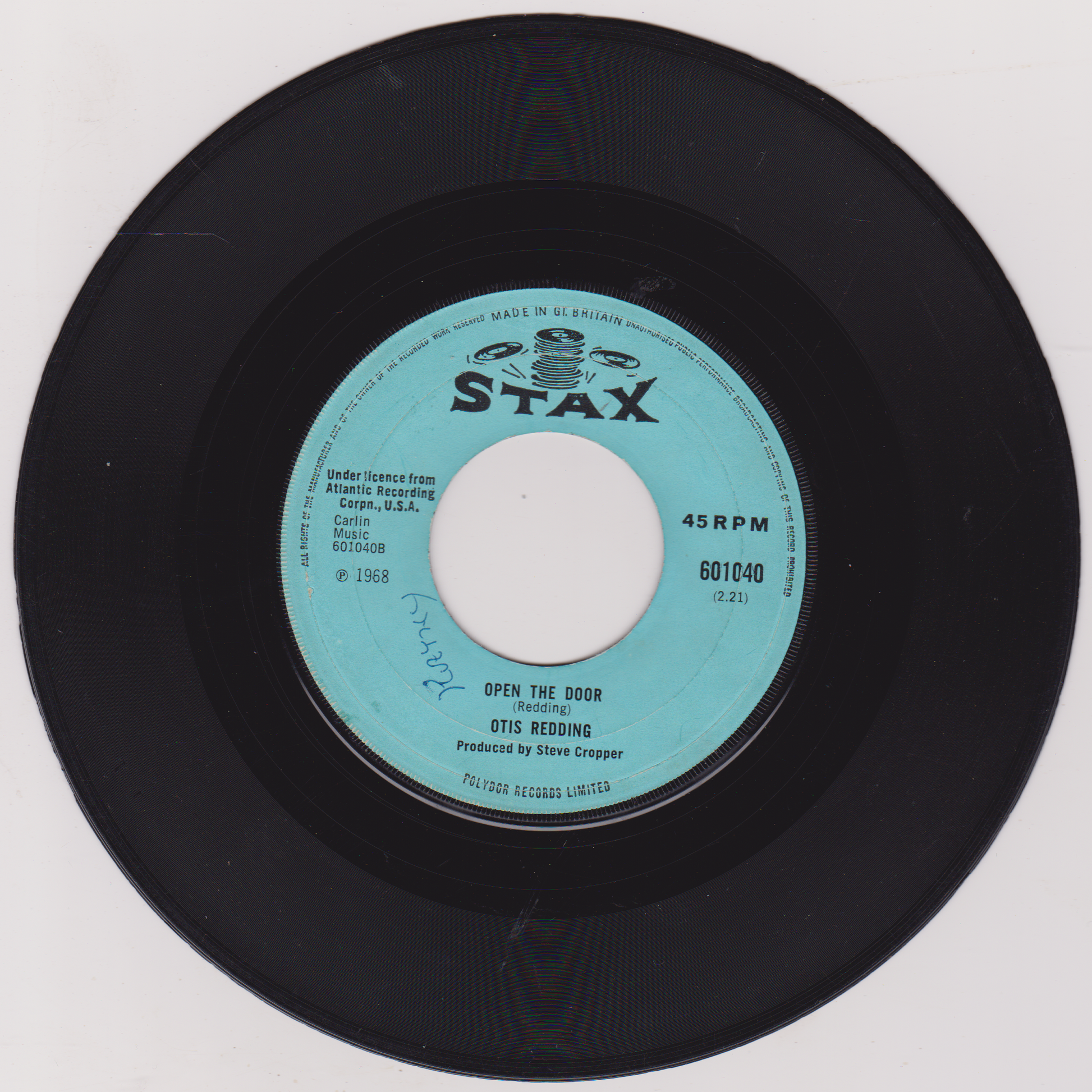 Black vinyl record with a blue label featuring the Stax logo on a white background