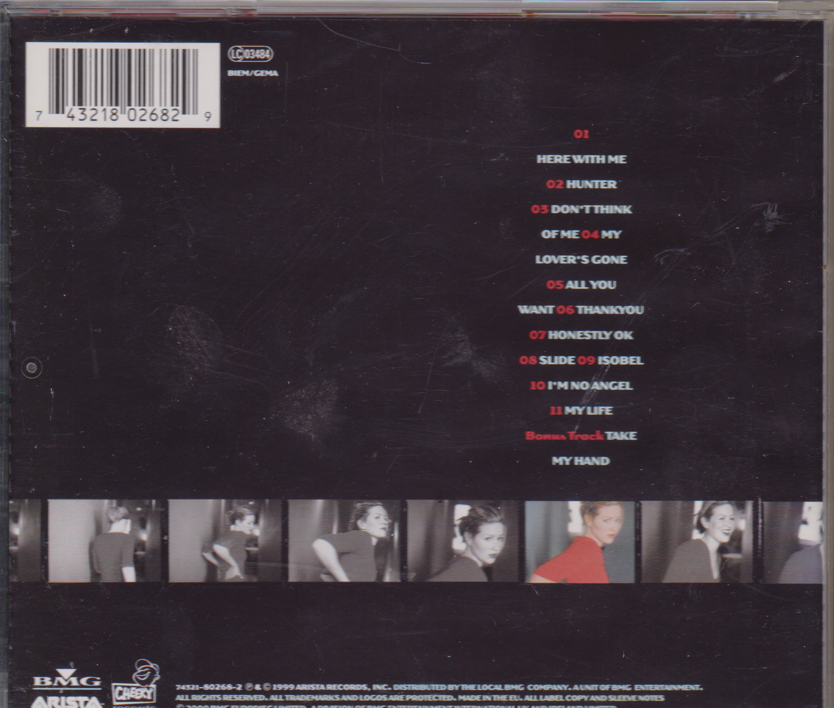 Back cover of a music album with tracklist and album art.
