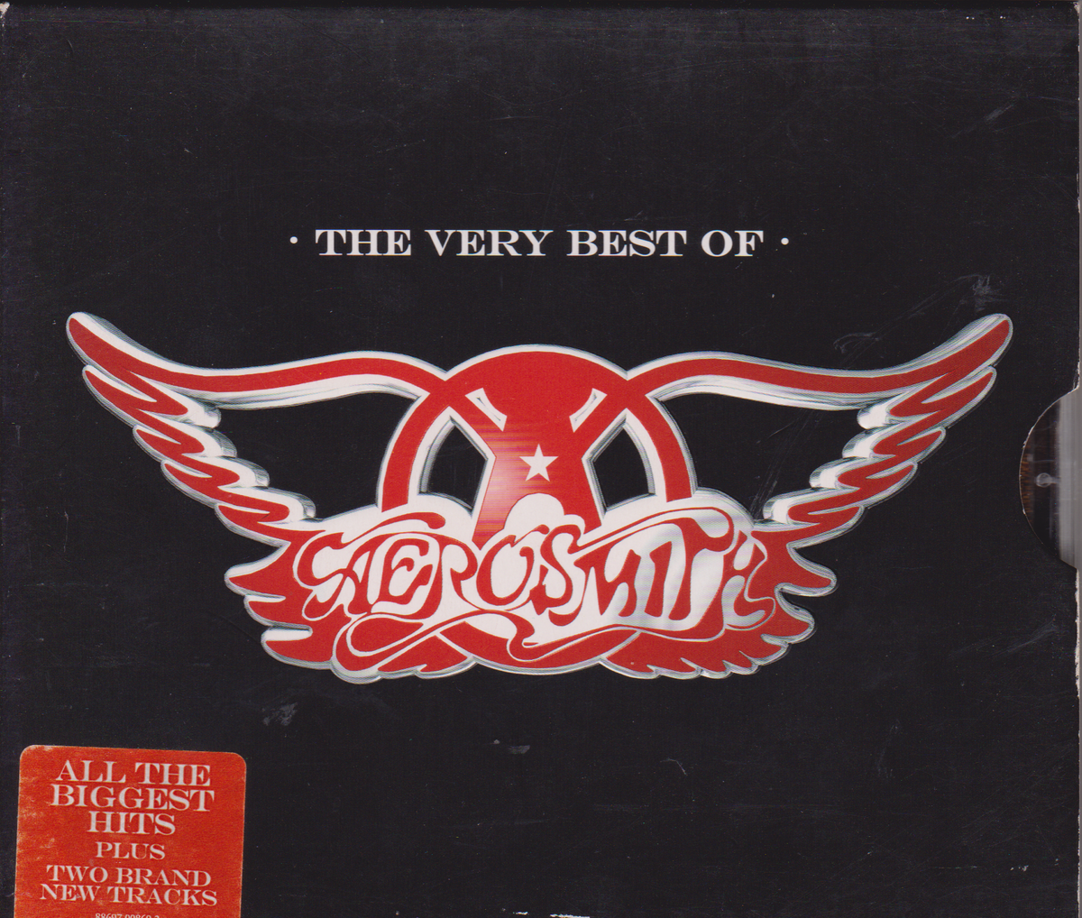 Aerosmith 'The Very Best Of' album cover, featuring the band's name in stylized red and white lettering with wings, on a black background with a red sticker in the lower left corner.