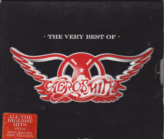 Aerosmith 'The Very Best Of' album cover, featuring the band's name in stylized red and white lettering with wings, on a black background with a red sticker in the lower left corner.