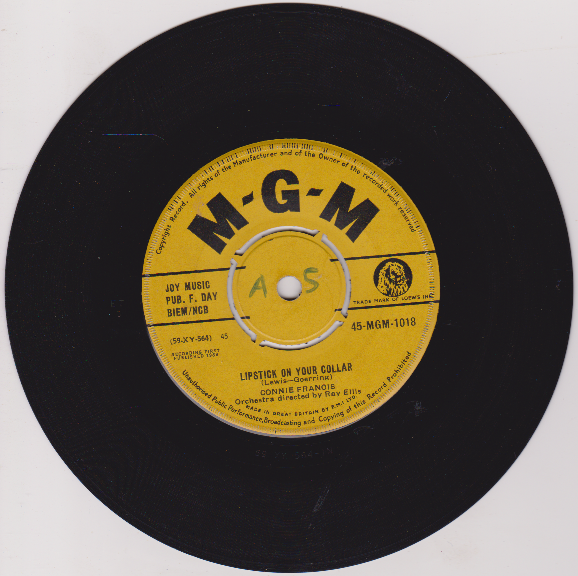 Black vinyl record with yellow label featuring MGM logo on a white background
