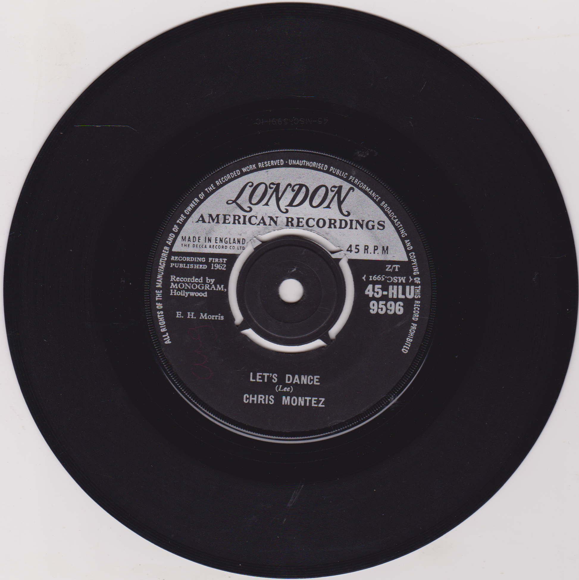 Black vinyl record with a label on a white background