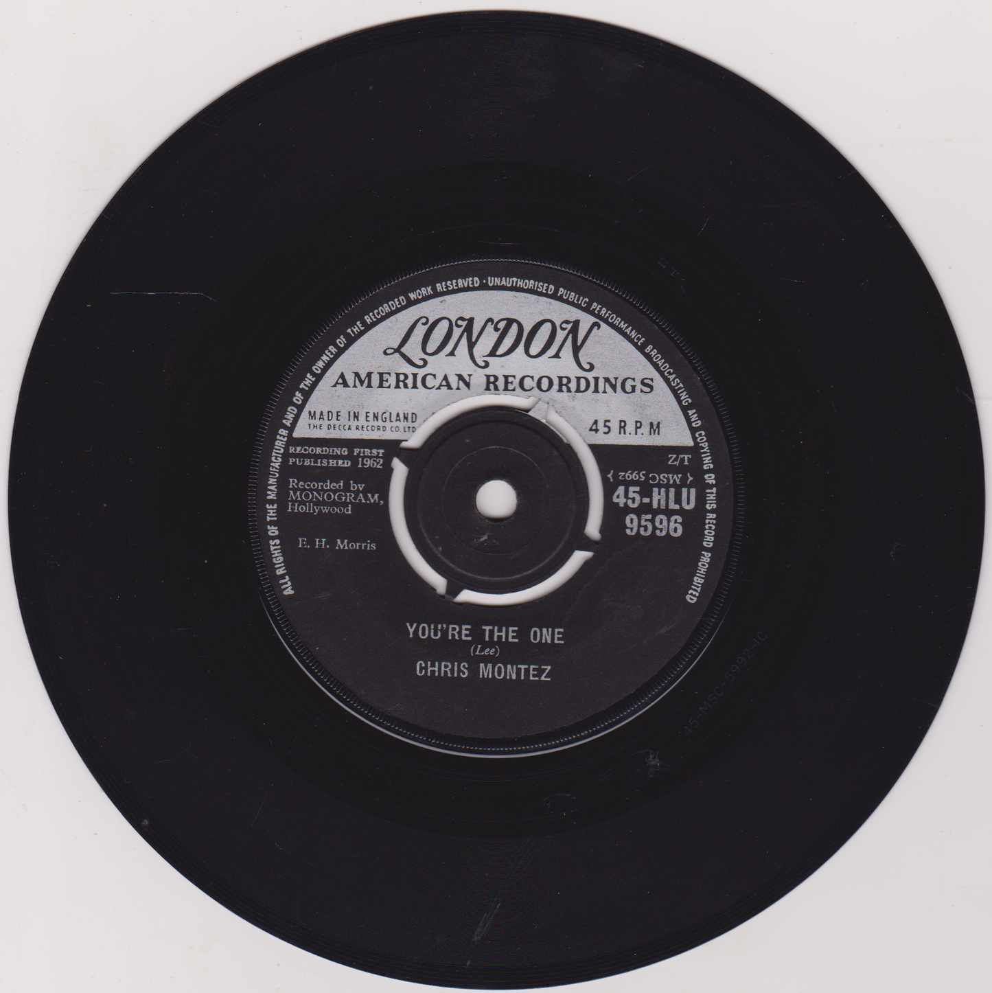 Black vinyl record with 'London American Recordings' label on a white background