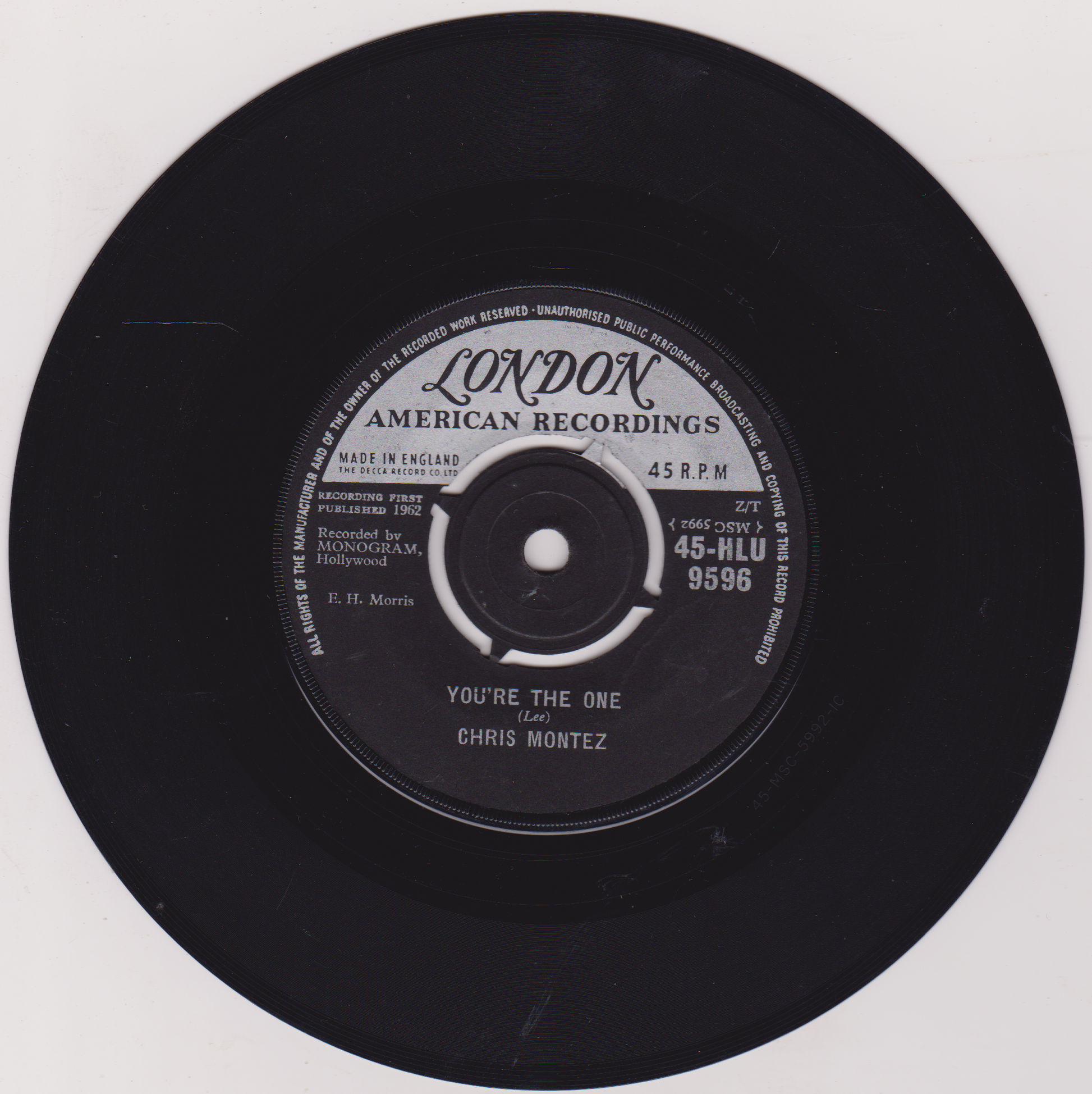 Black vinyl record with 'London American Recordings' label on a white background