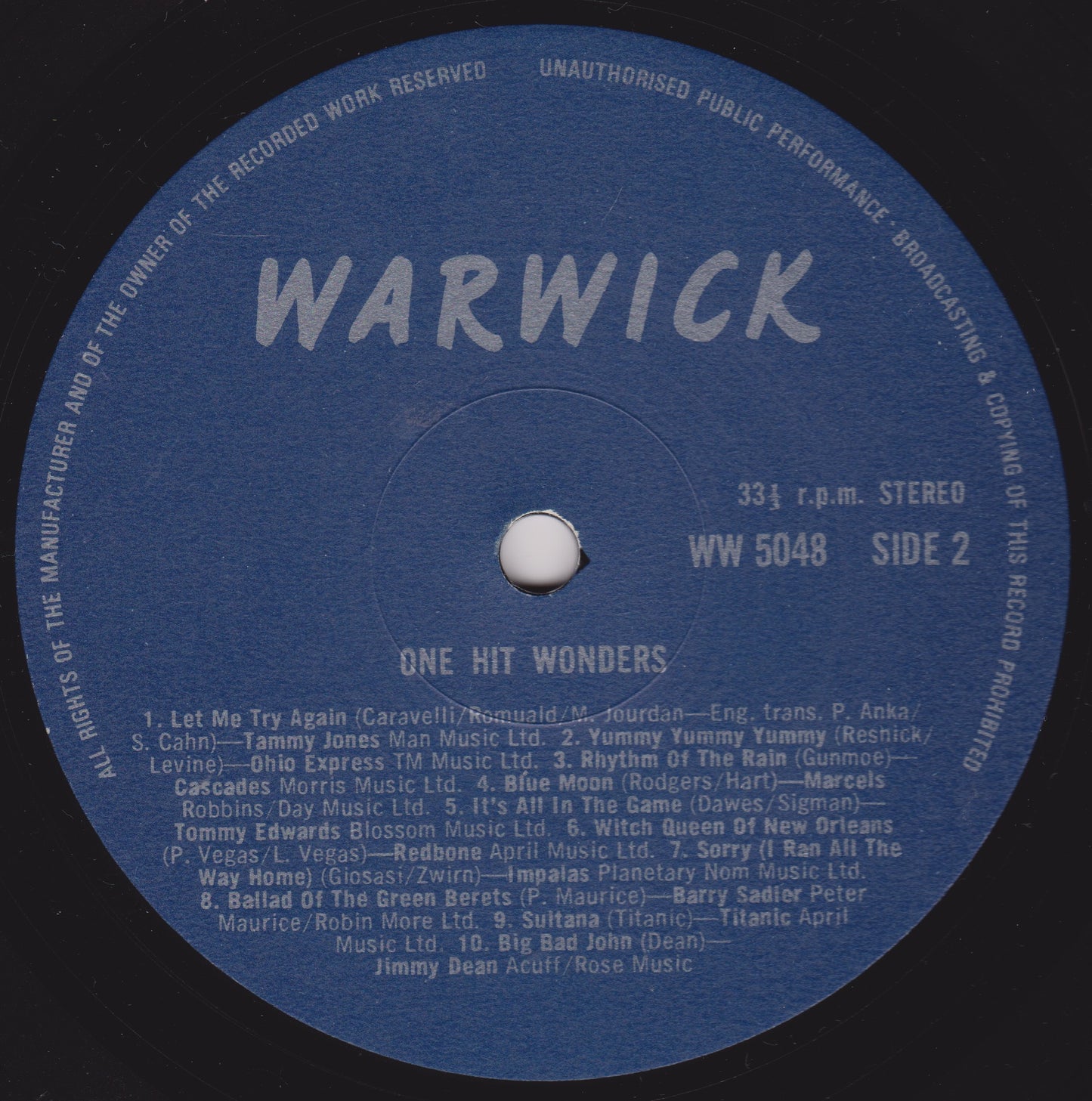 Record label with 'WARWICK' branding and tracklist on a blue background