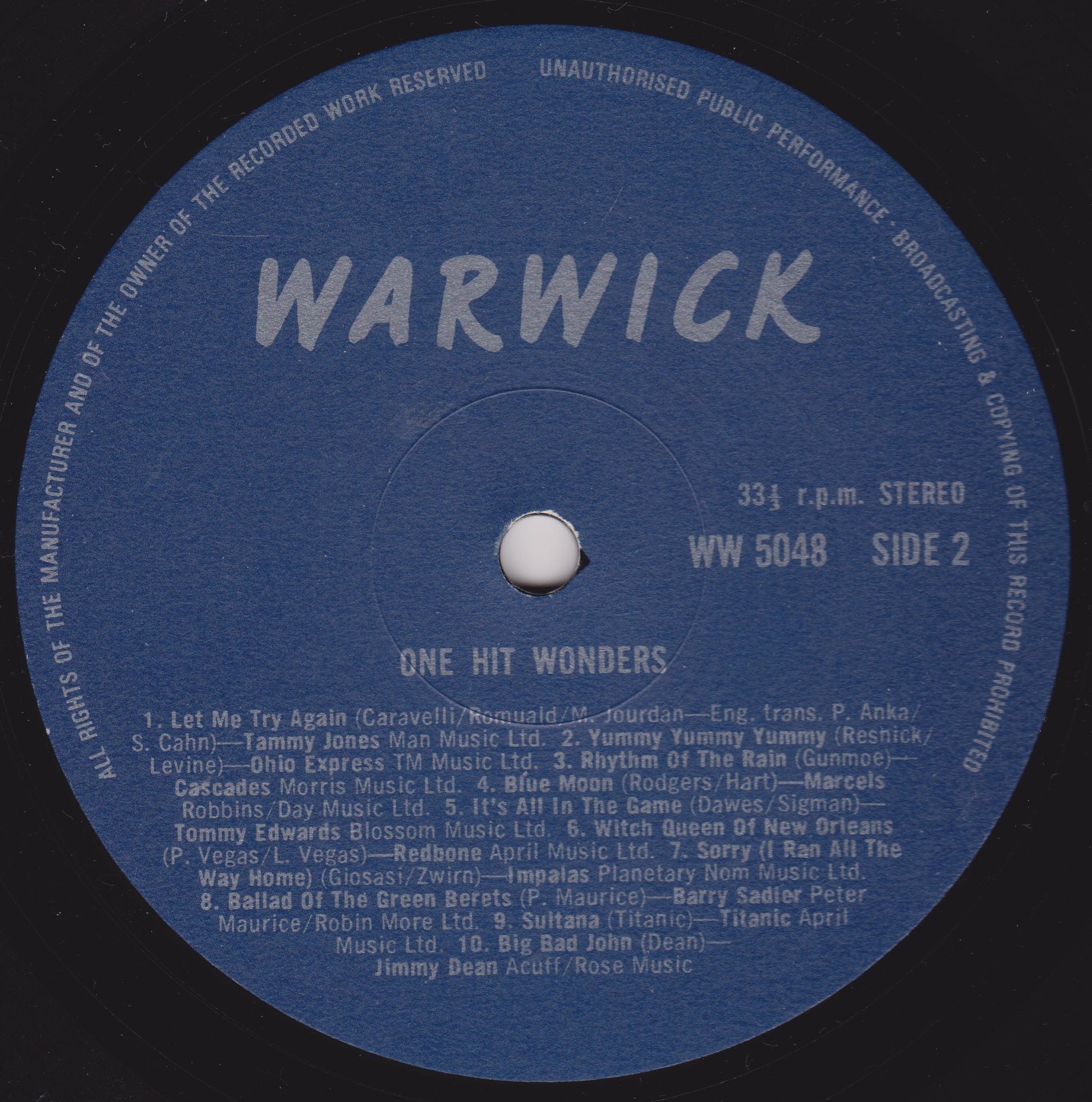 Record label with 'WARWICK' branding and tracklist on a blue background