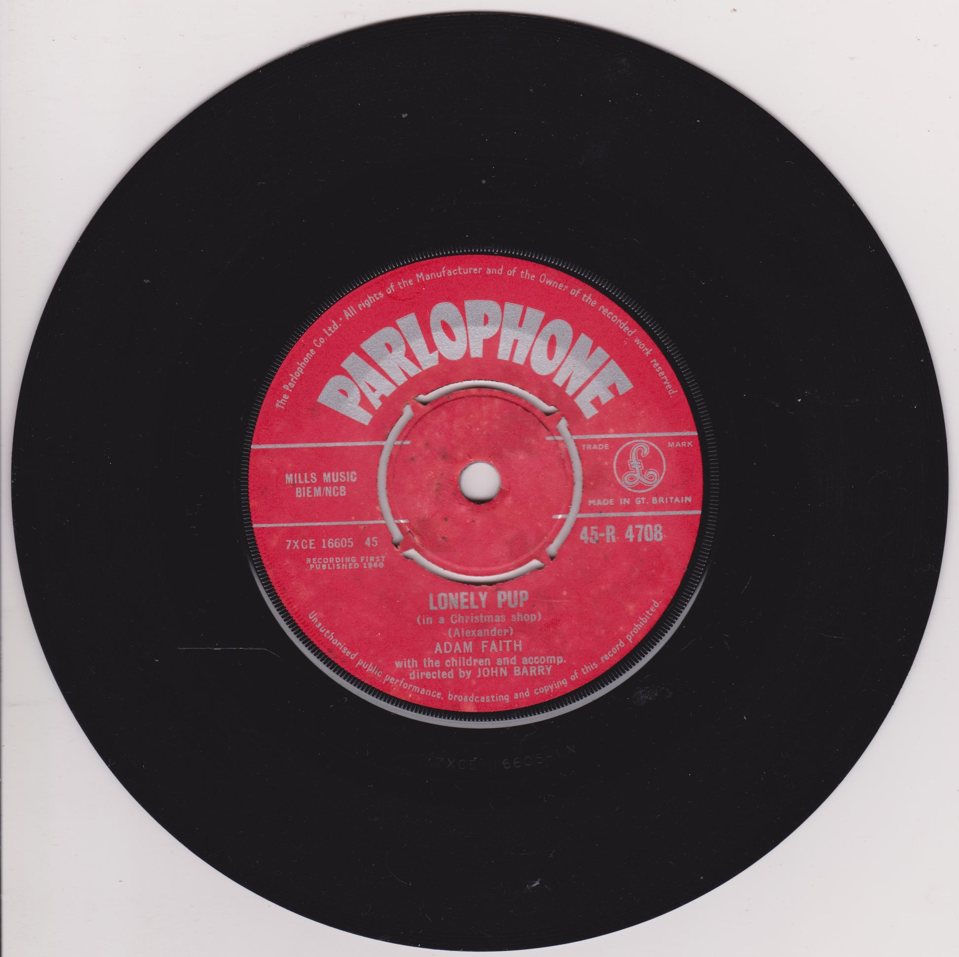 Parlophone vinyl record with red label on a white background