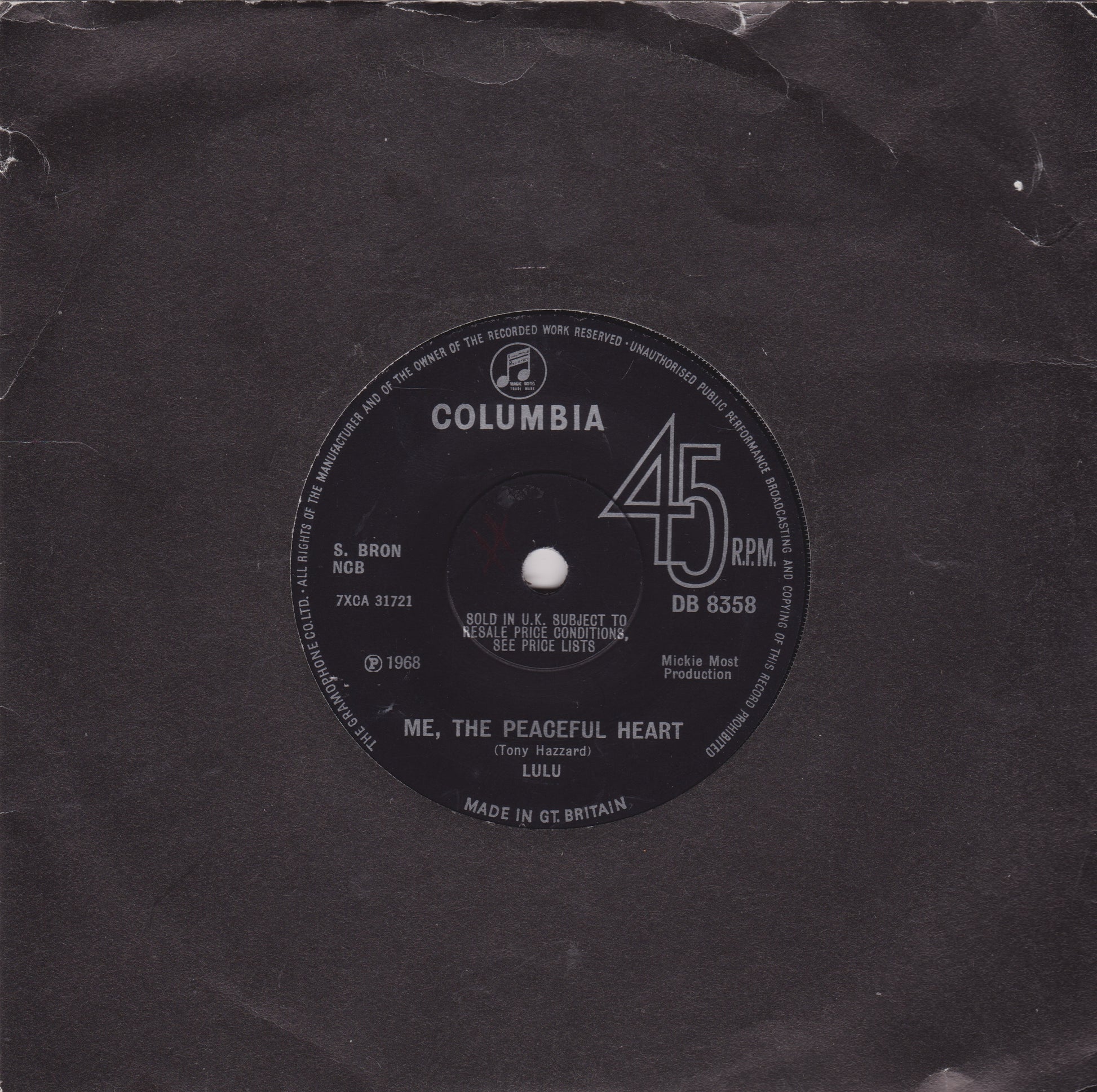 Columbia 45 RPM record label on a textured black surface