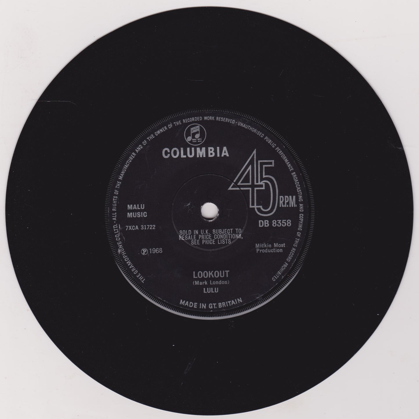Black vinyl record with a Columbia label on a white background