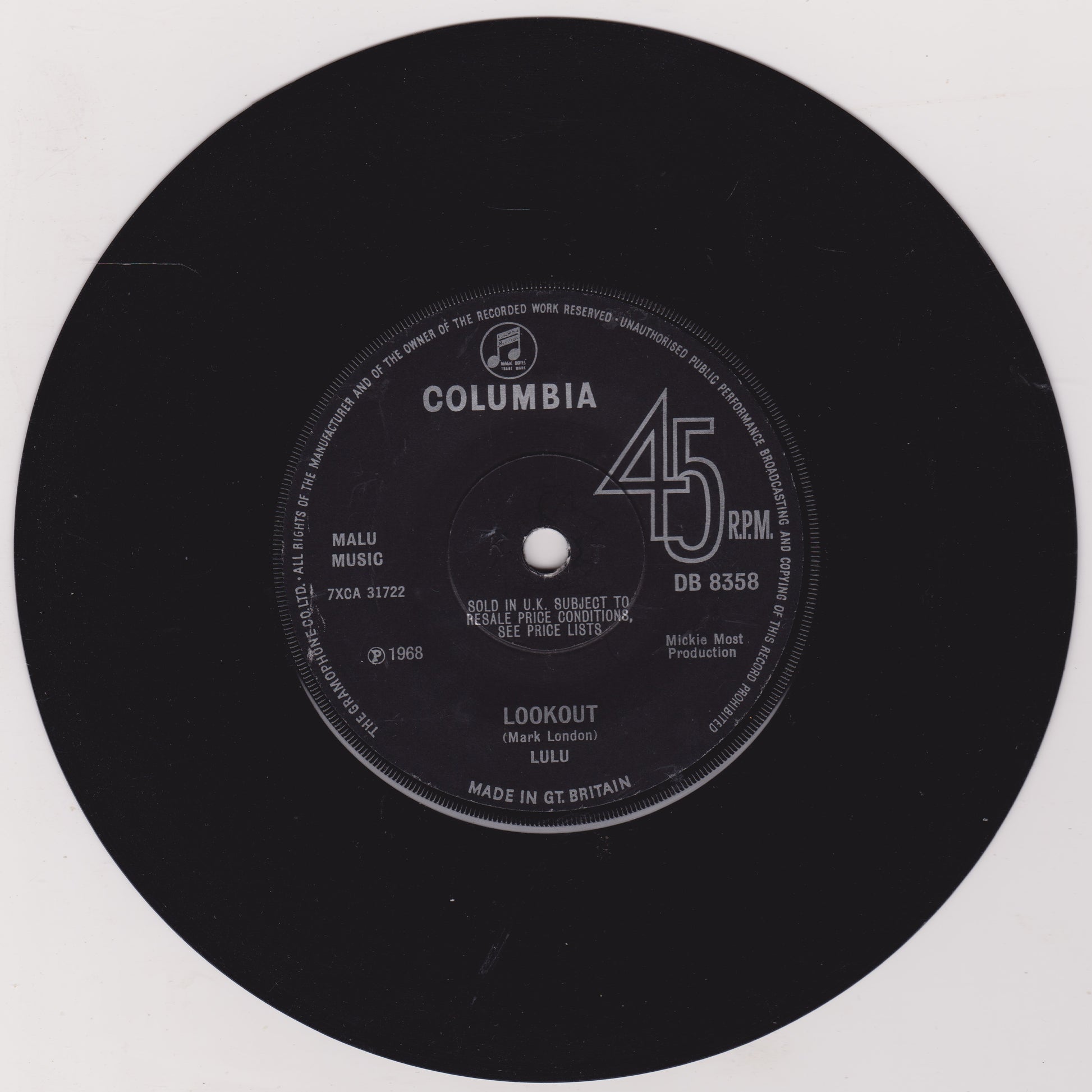 Black vinyl record with a Columbia label on a white background