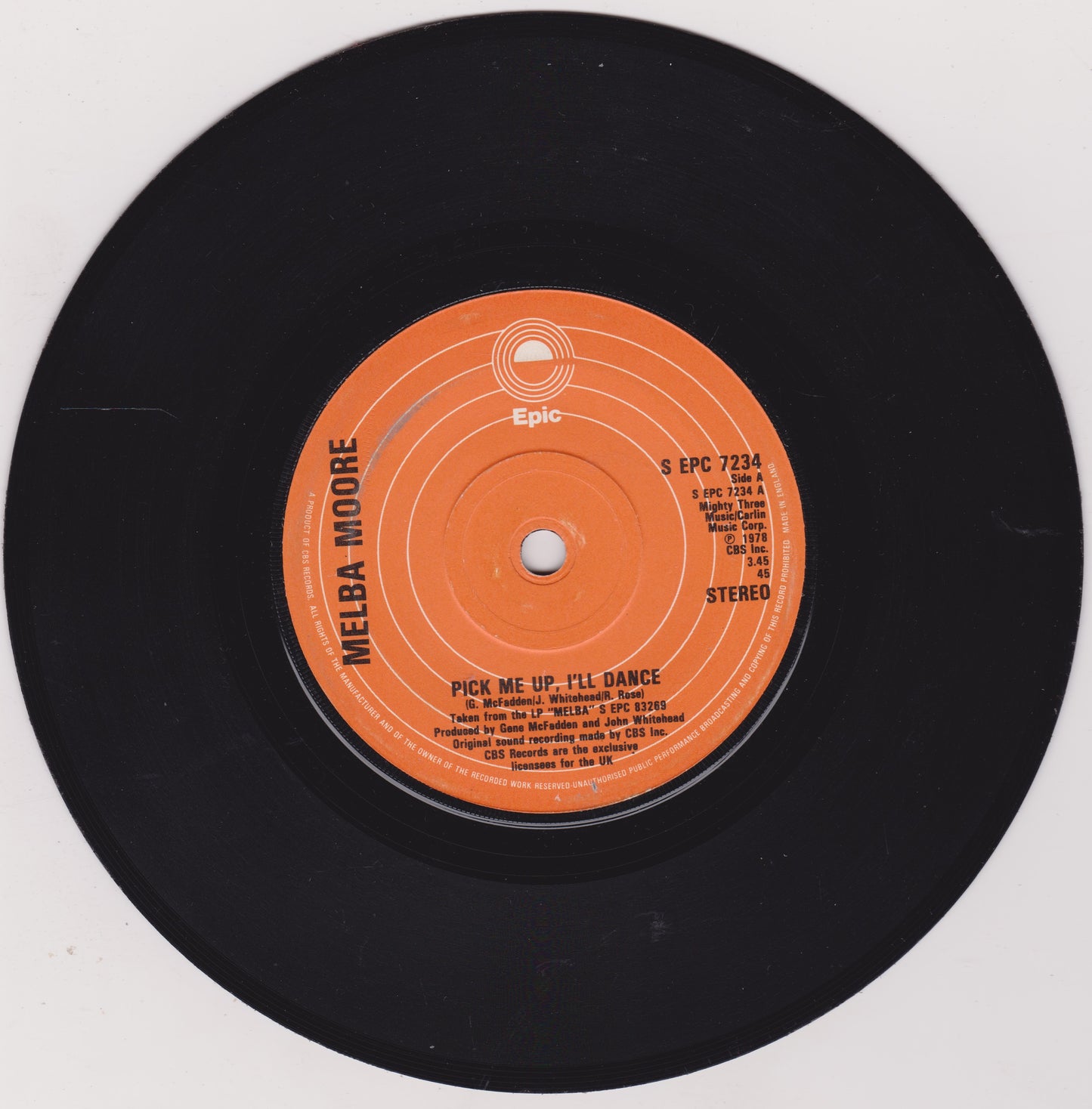 Vinyl record with orange label on a white background