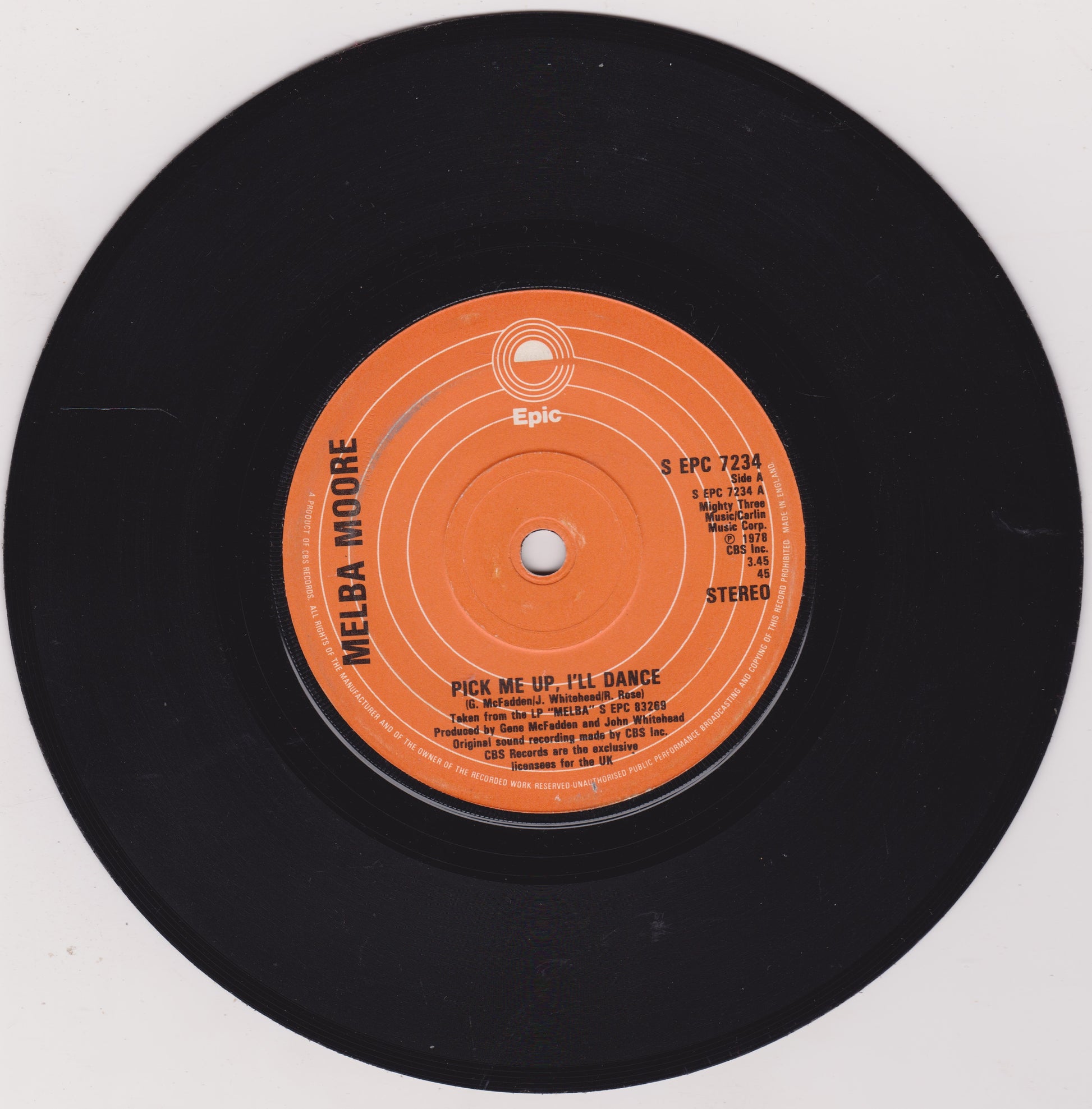 Vinyl record with orange label on a white background