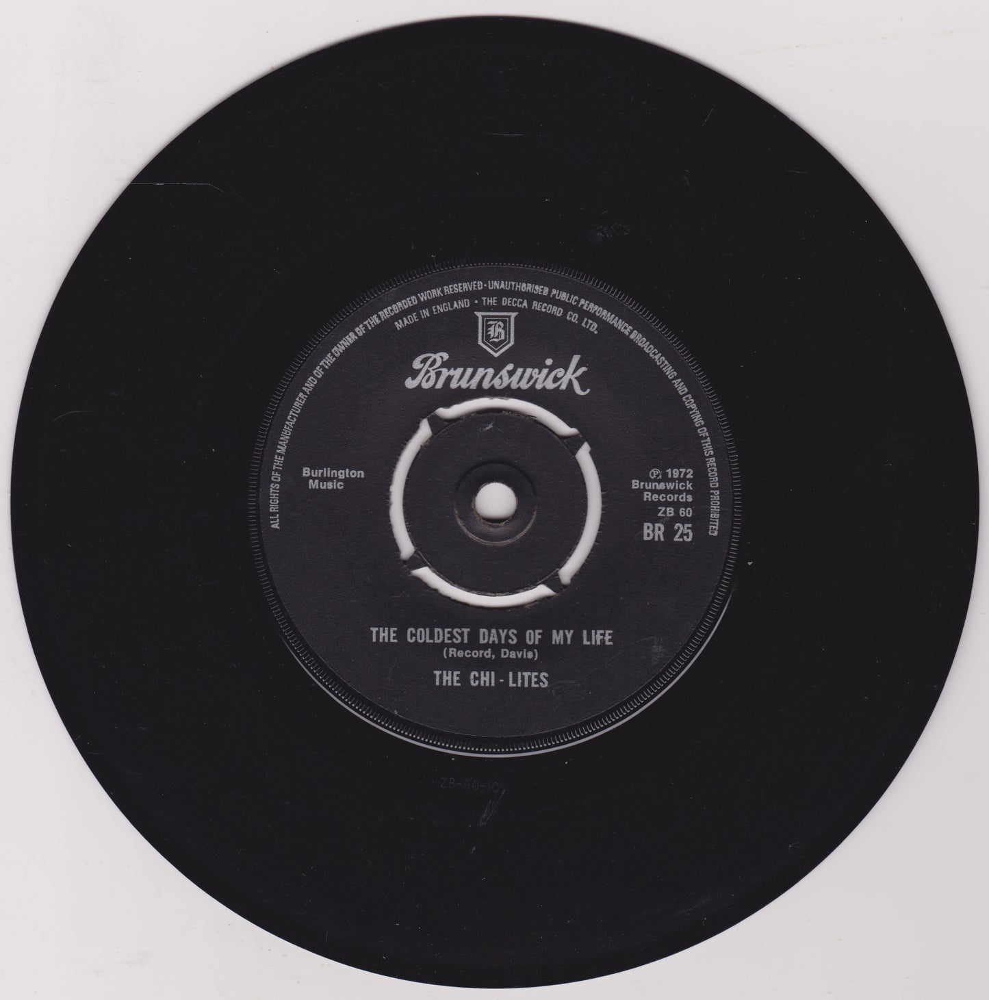 Black vinyl record with 'Brunswick' label on a white background