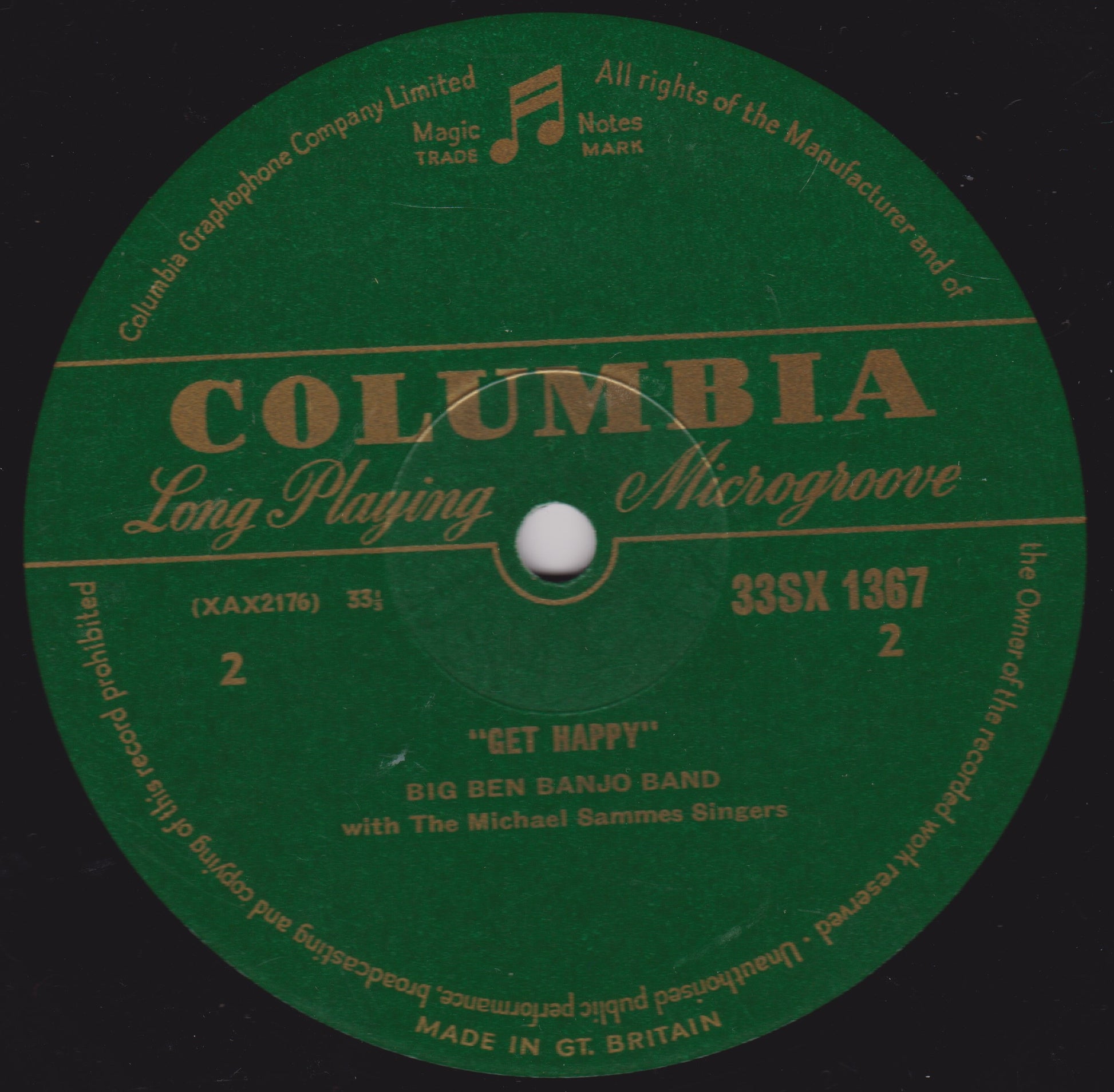 Columbia record label with text and music notes on a green background