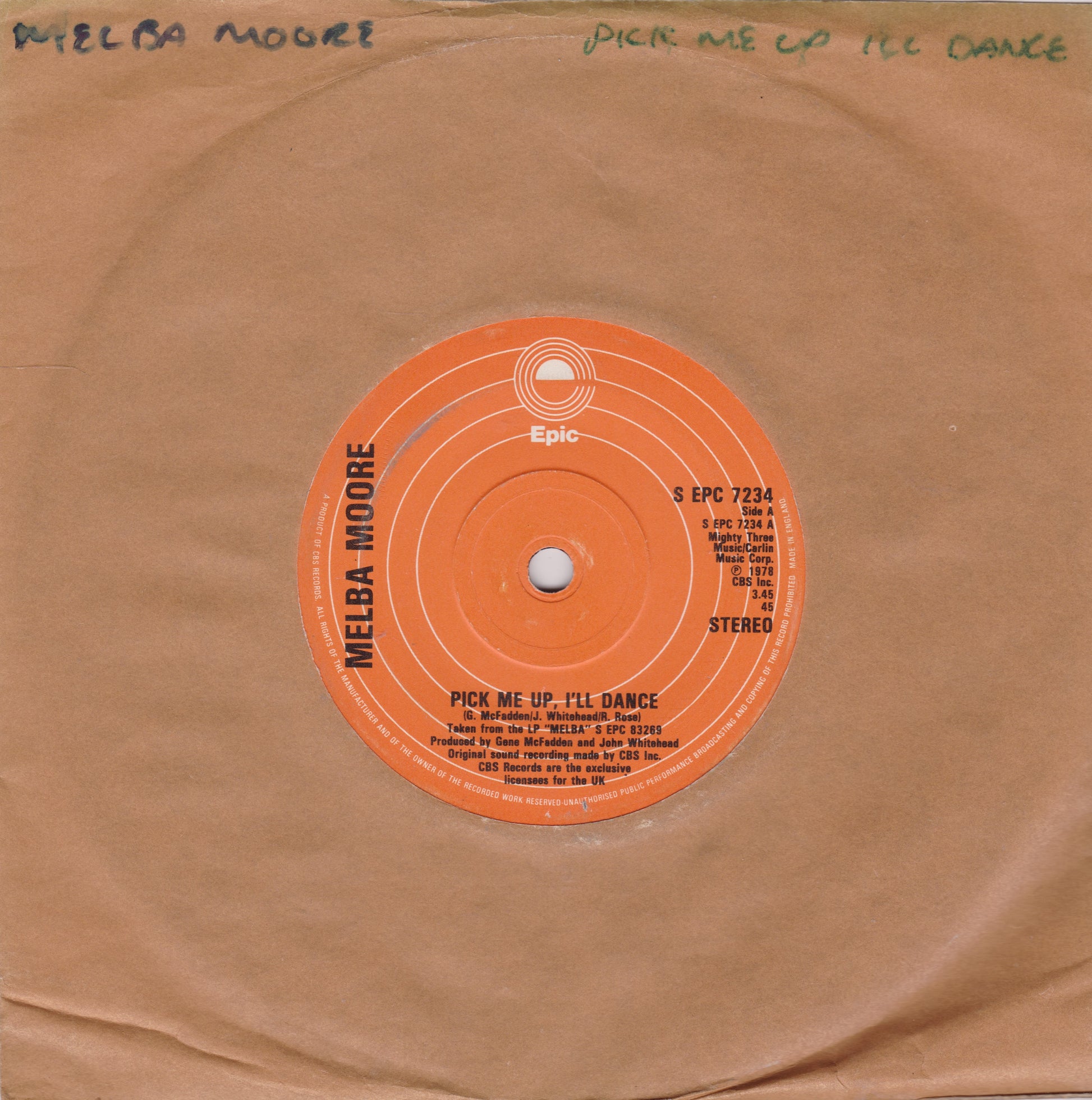 Record label of a vinyl record with 'Melba Moore' and 'Pick Me Up, I'll Dance' text on an orange label.
