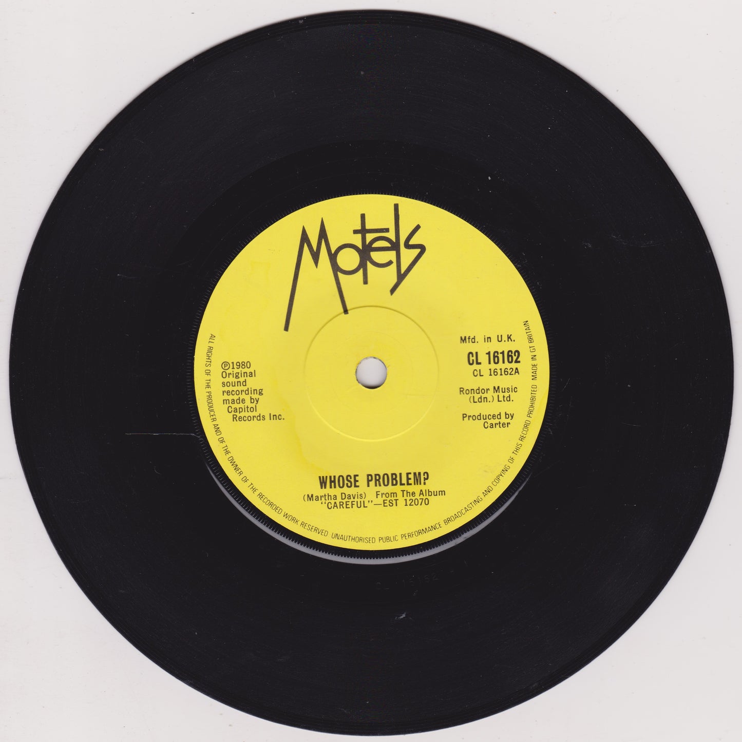 Vinyl record with yellow label featuring 'Motels' on a white background