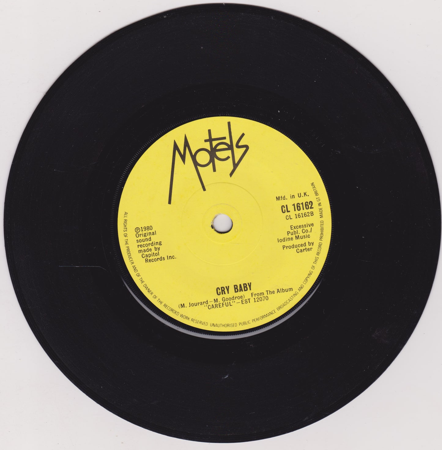 Vinyl record with yellow label featuring 'Motels' on a white background