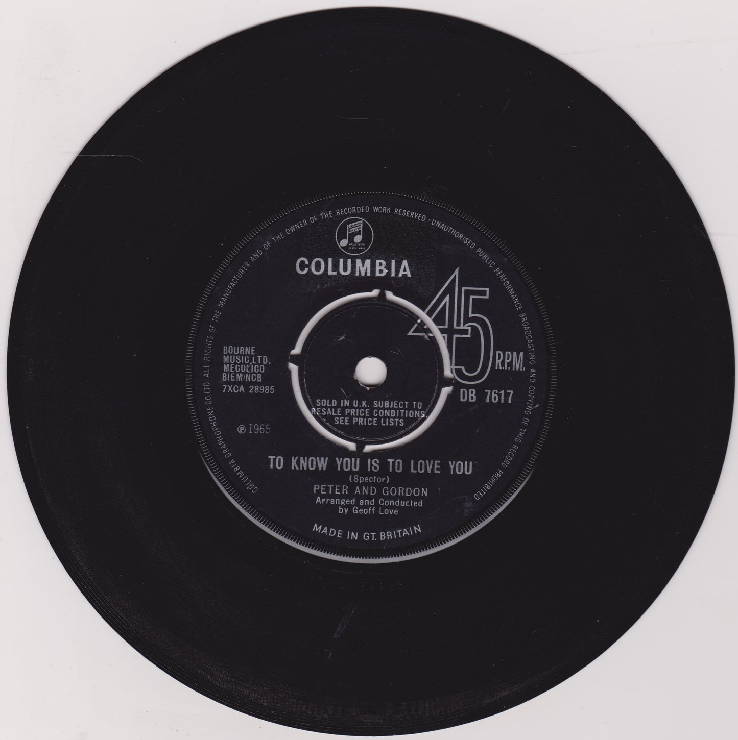 Black vinyl record with Columbia label on a white background