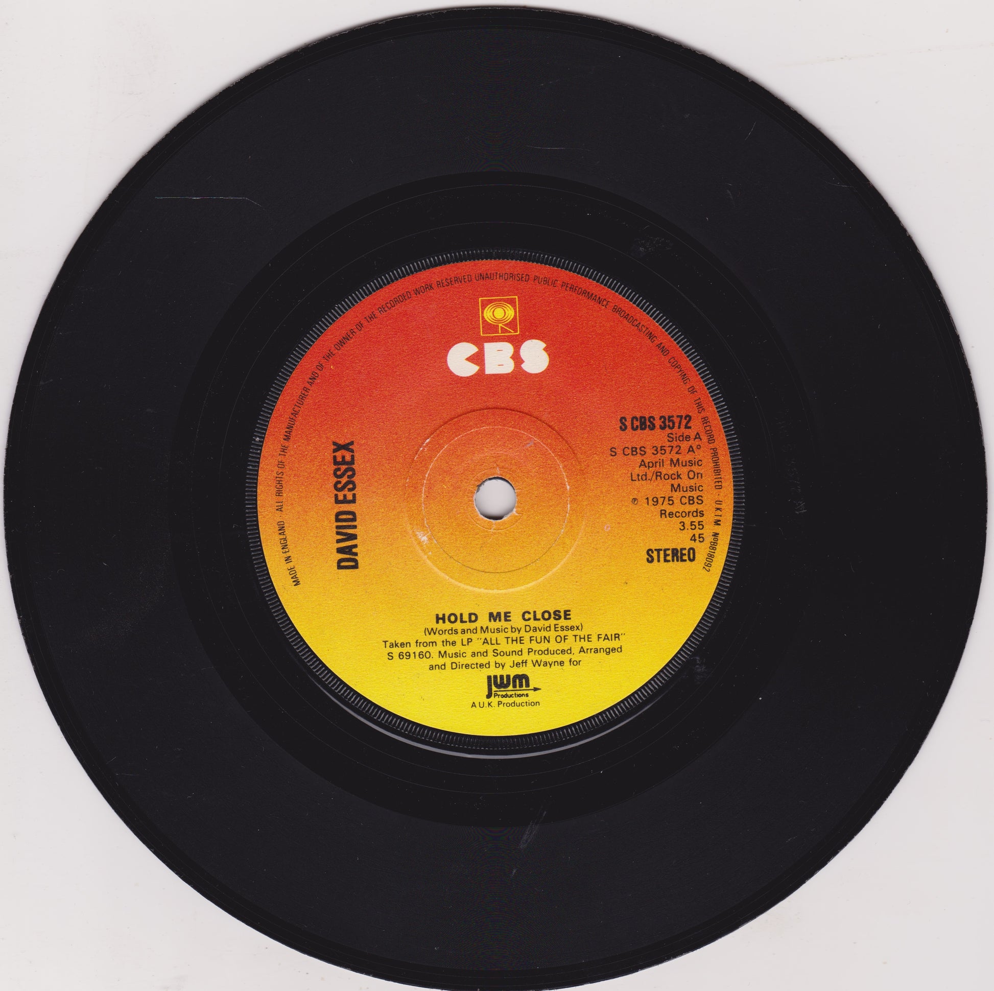 Vinyl record with CBS label on a white background